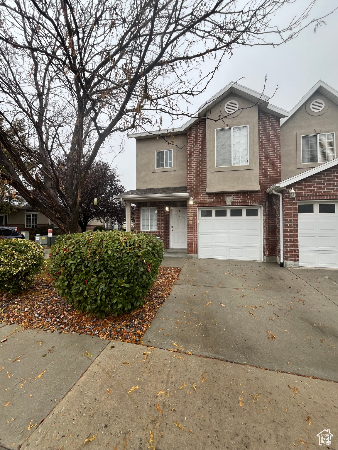 View of property featuring a garage