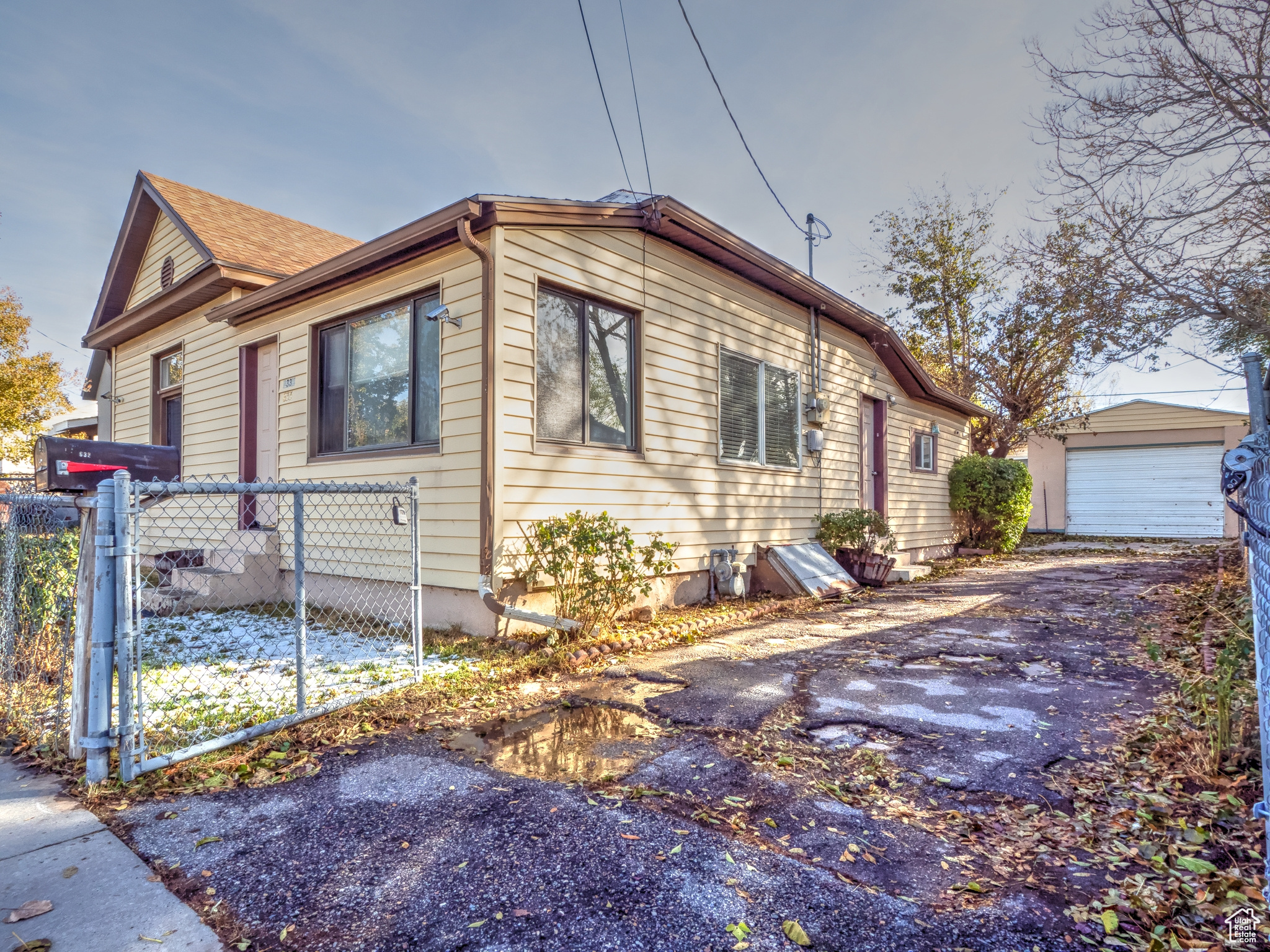 Driveway and garage, west side