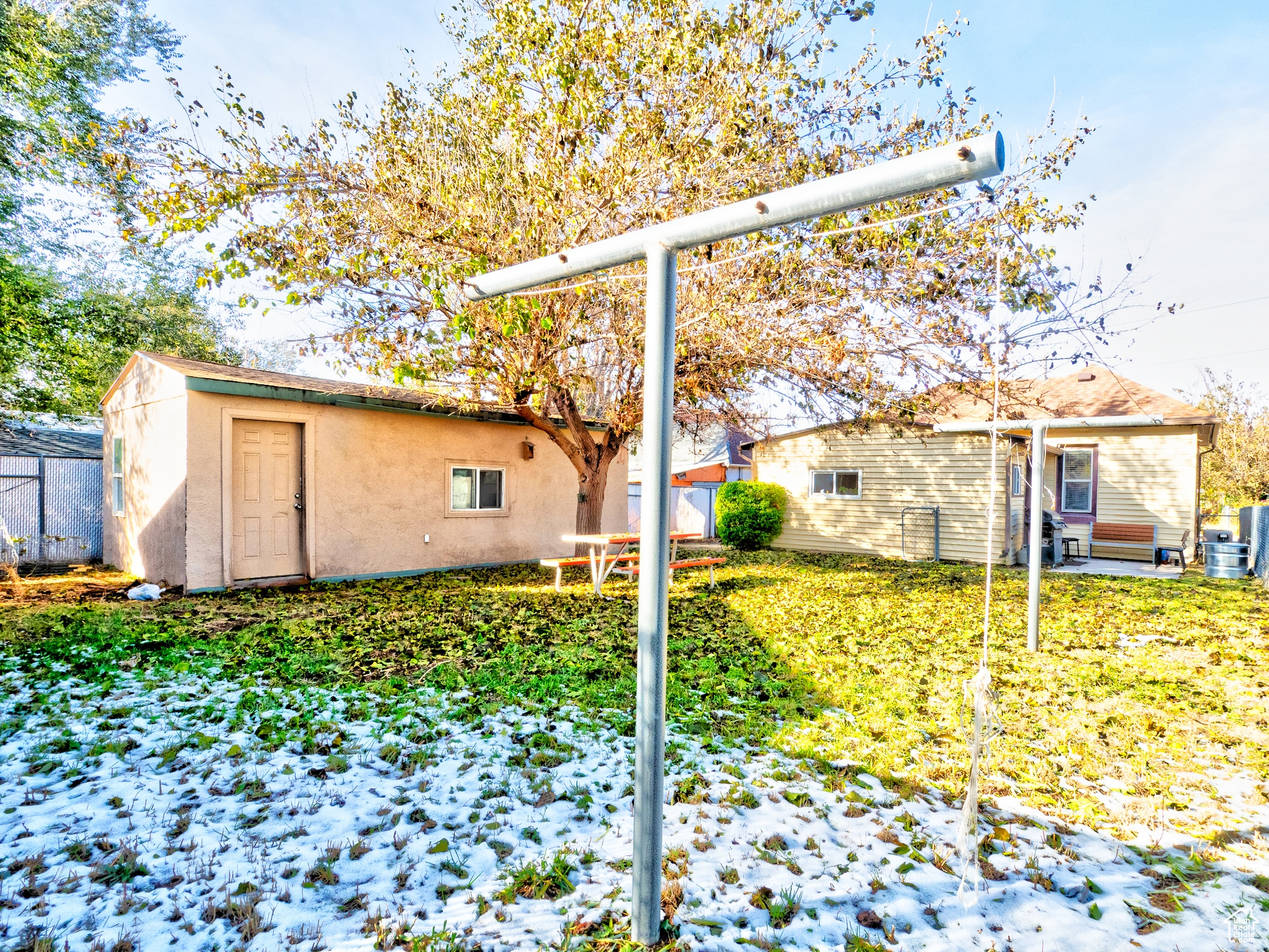 Side view of garage; yard