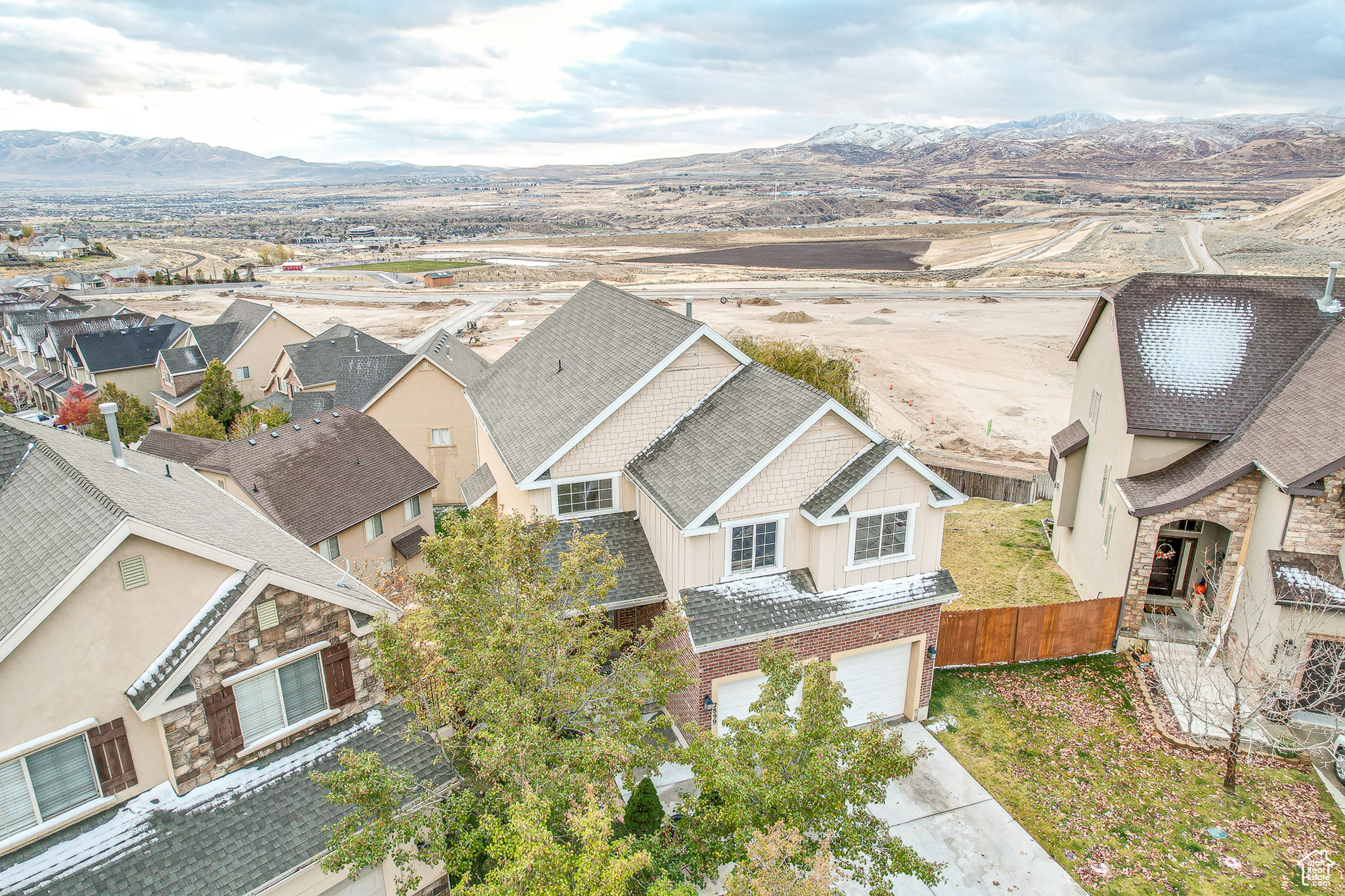 Birds eye view of property with a mountain view