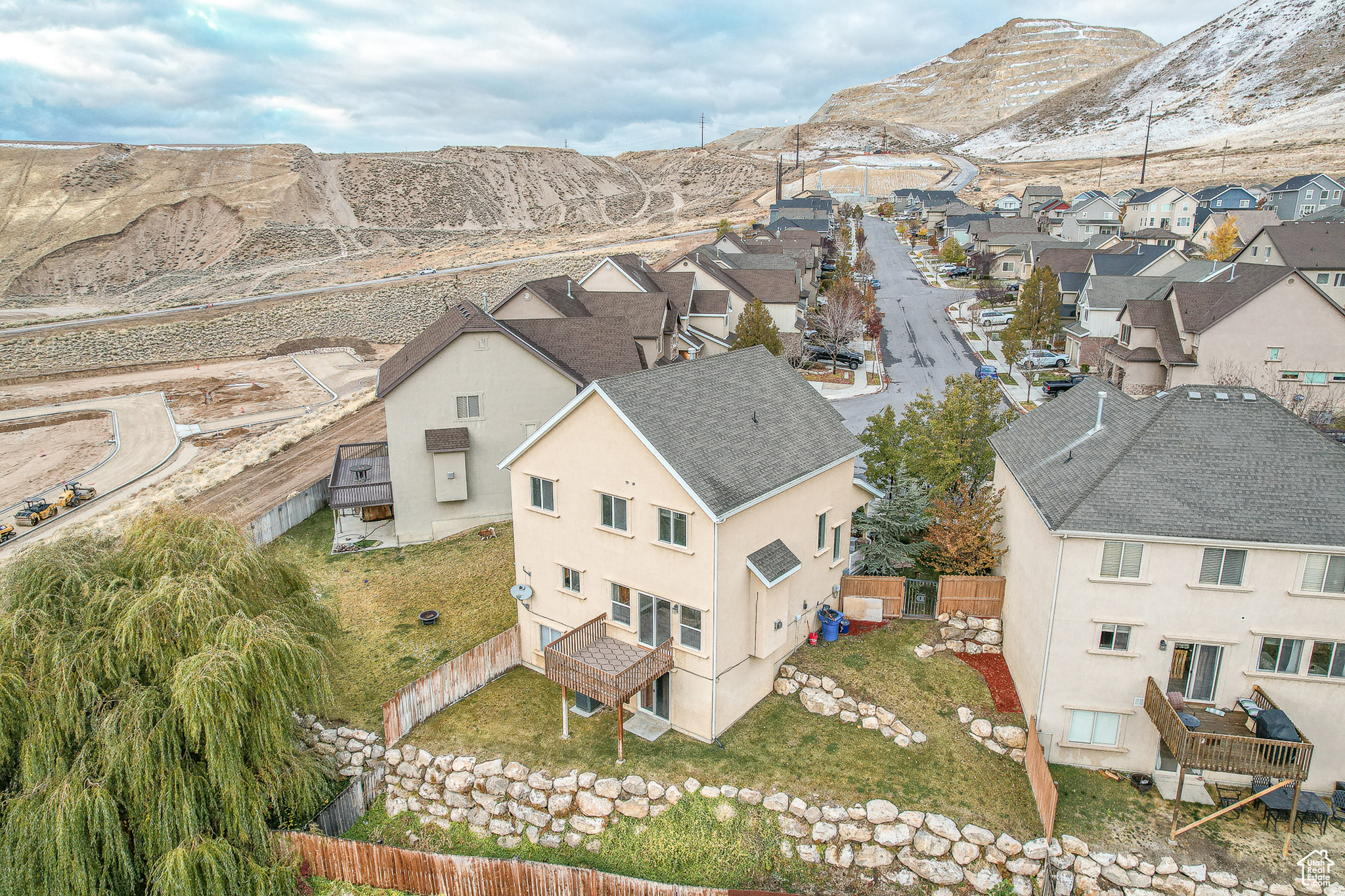 Birds eye view of property with a mountain view