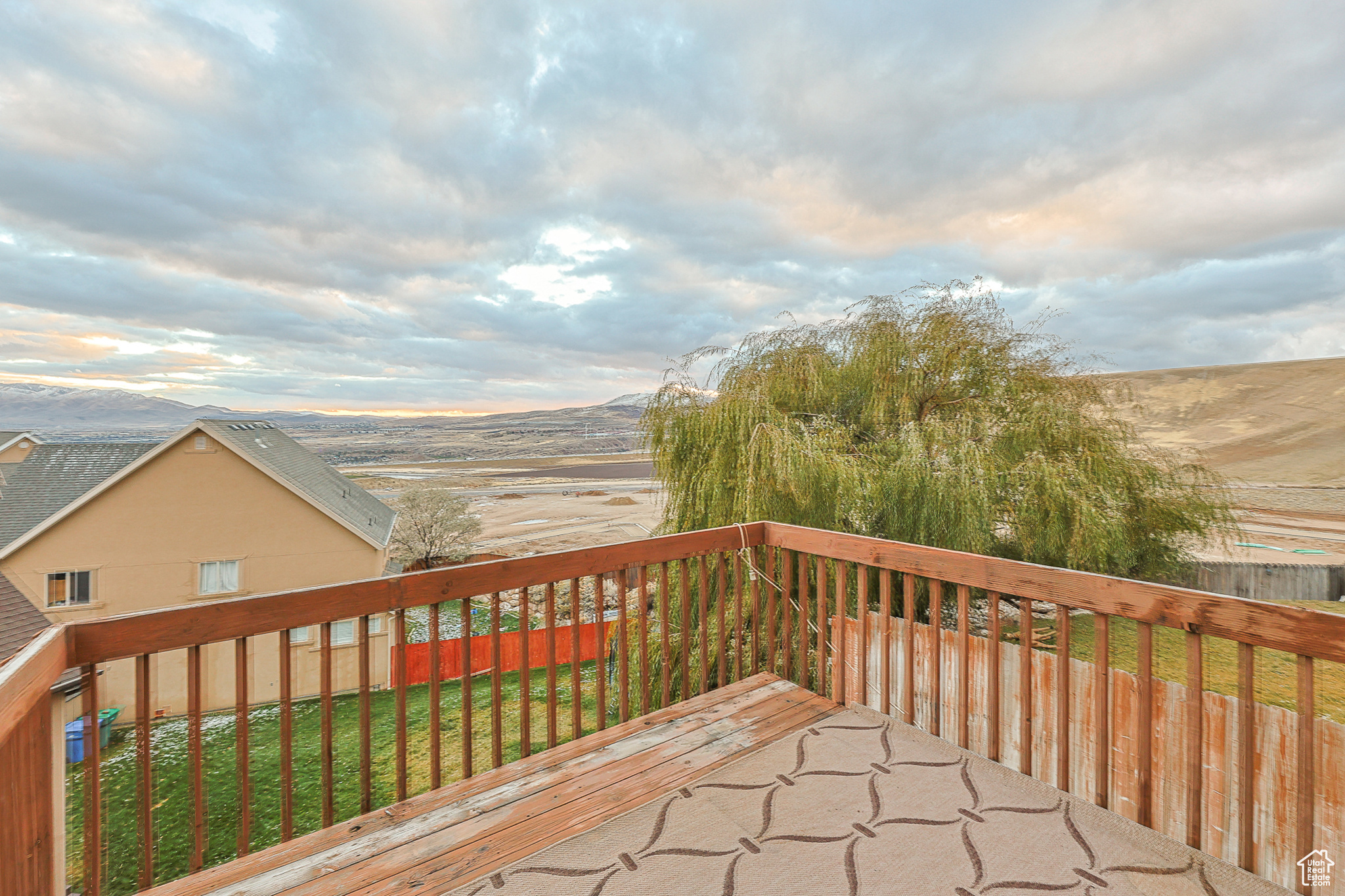 Wooden deck featuring a mountain view