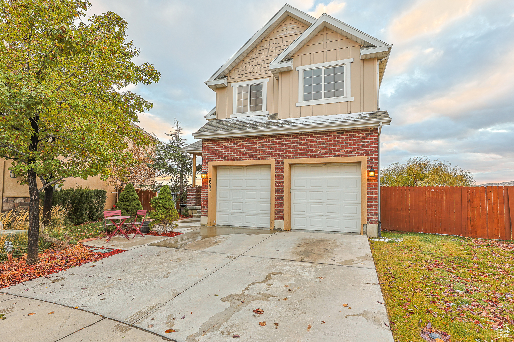 View of front facade featuring a garage