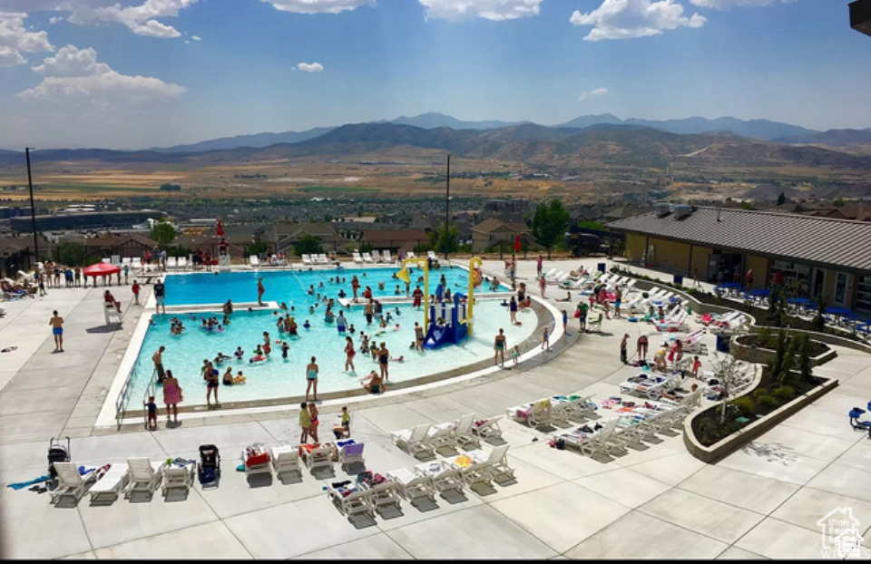 View of pool featuring a mountain view