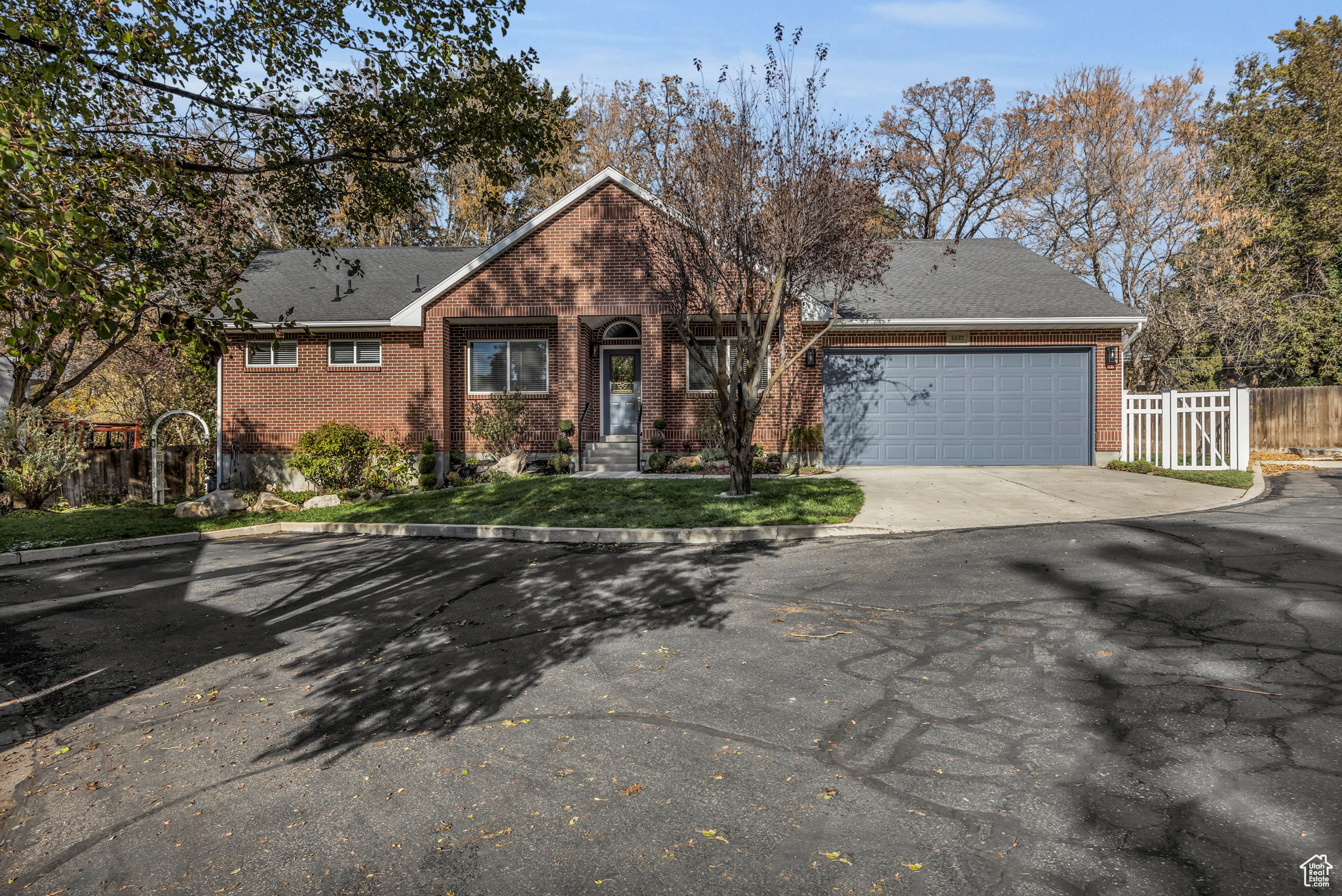 View of front of property featuring a garage