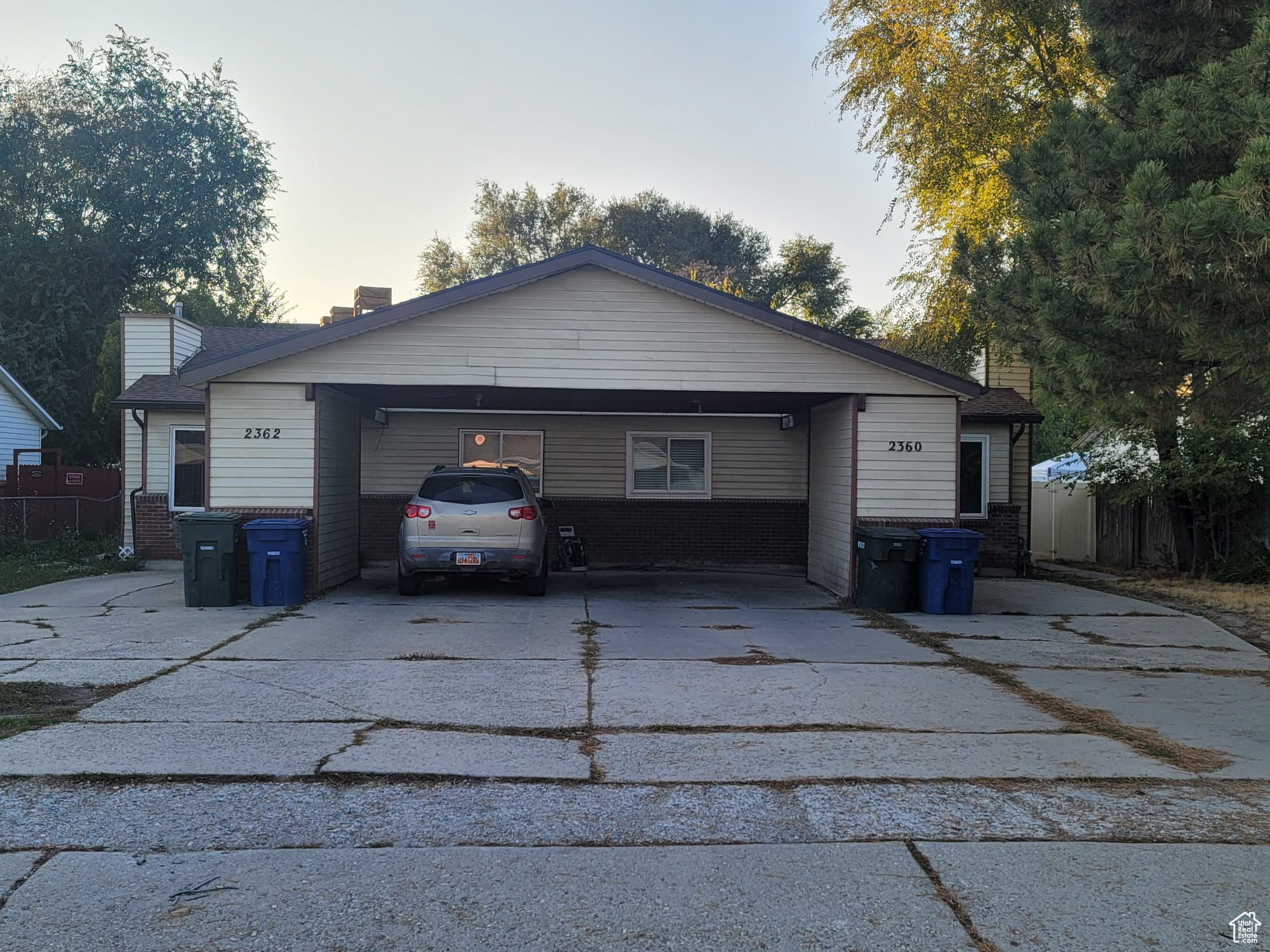 Exterior space featuring a carport