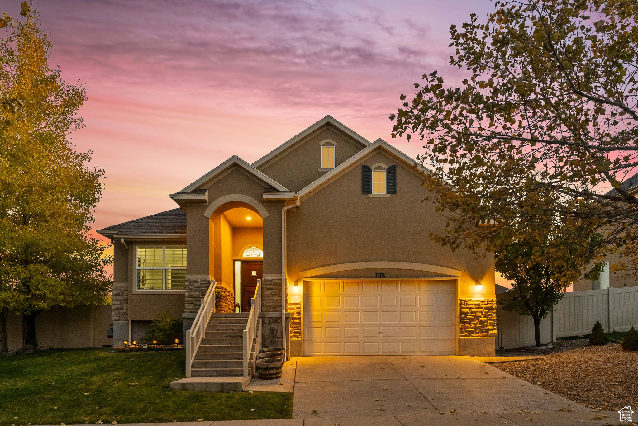 View of front of property with a garage