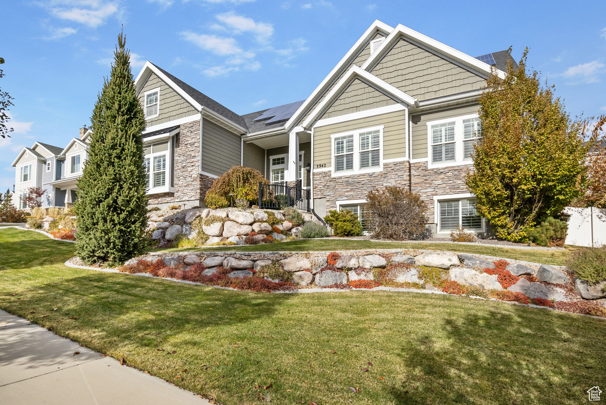 View of front of property with a front lawn