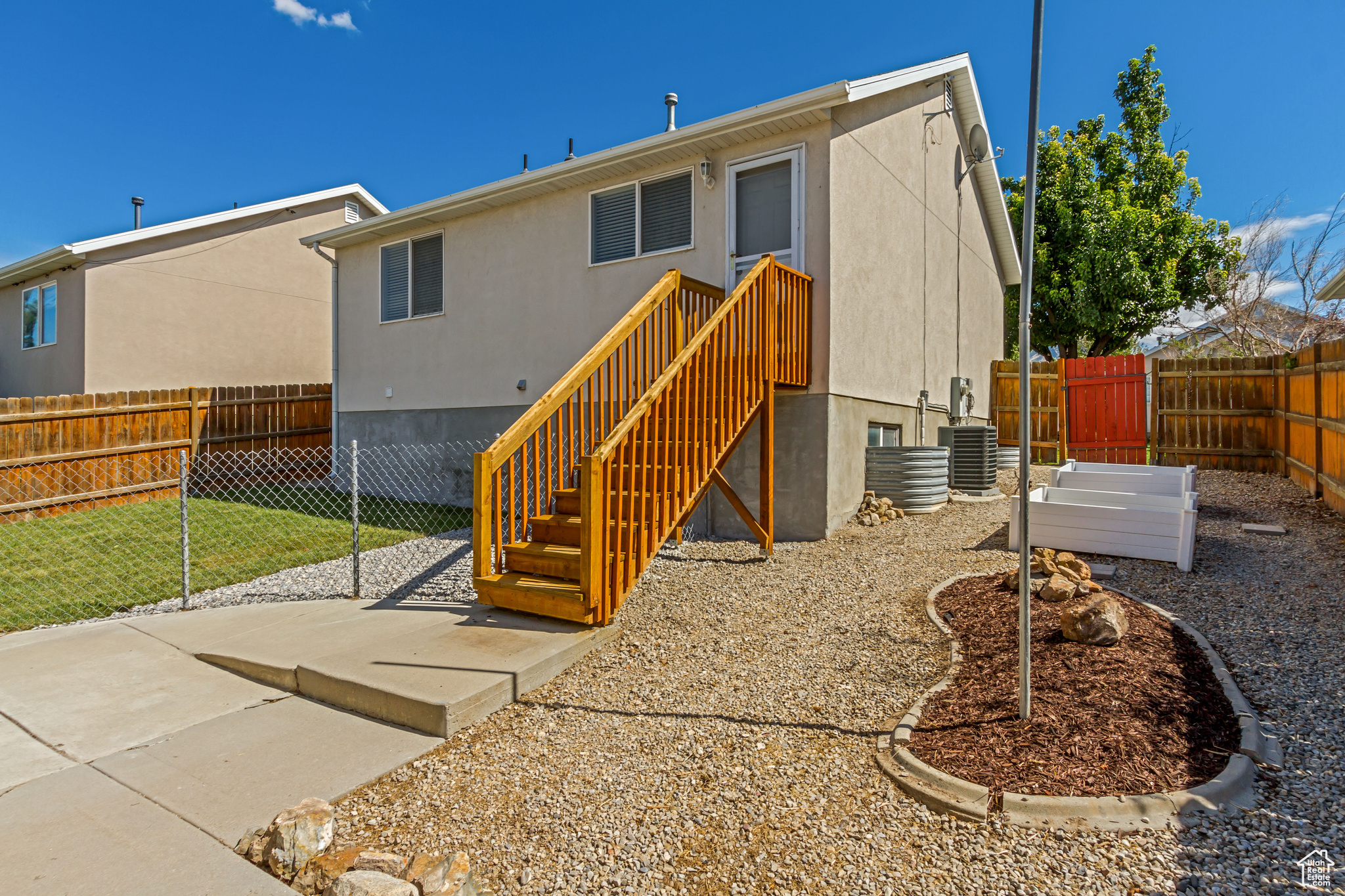 Back of property with central AC unit