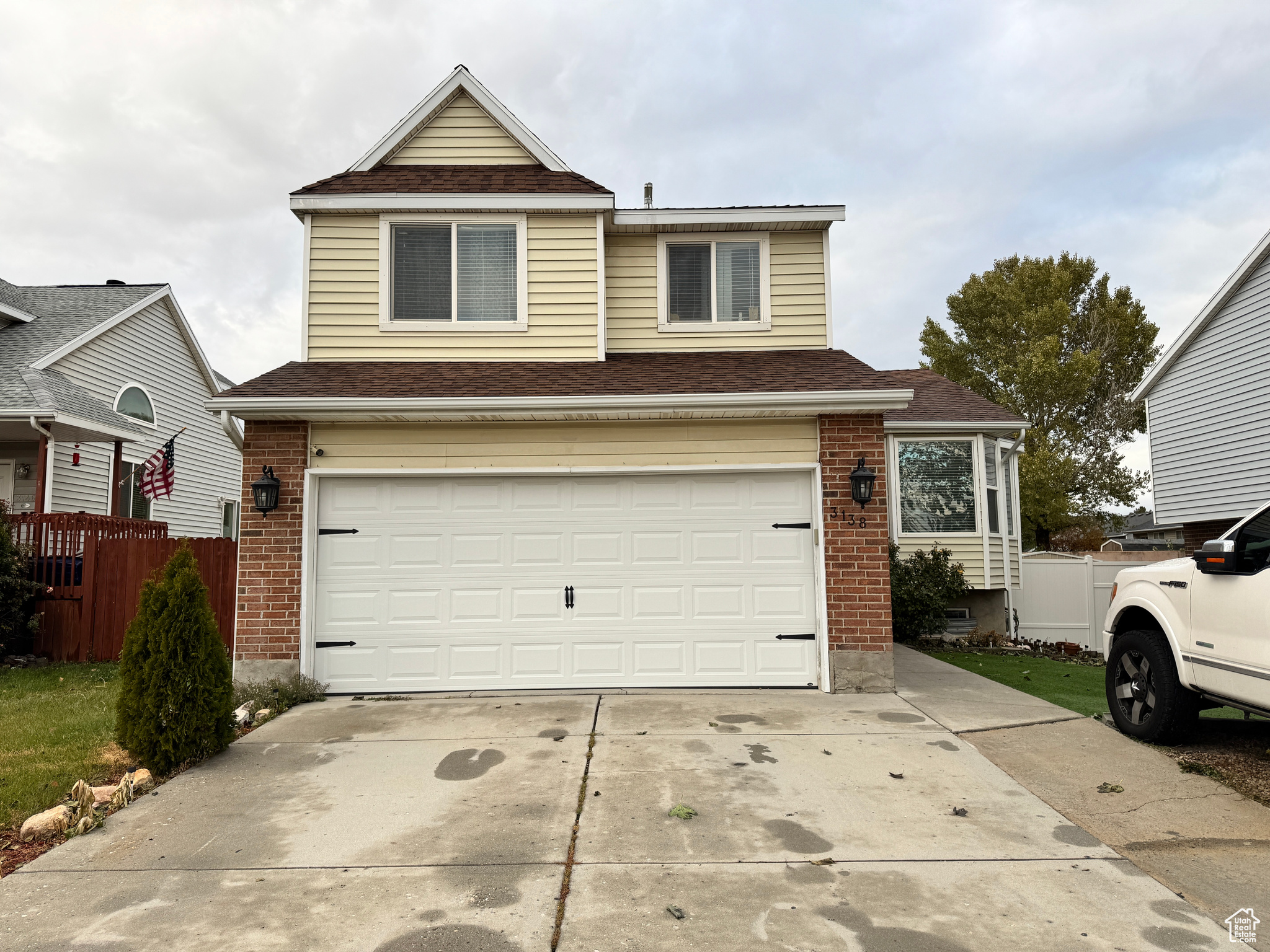 Front of property with a garage