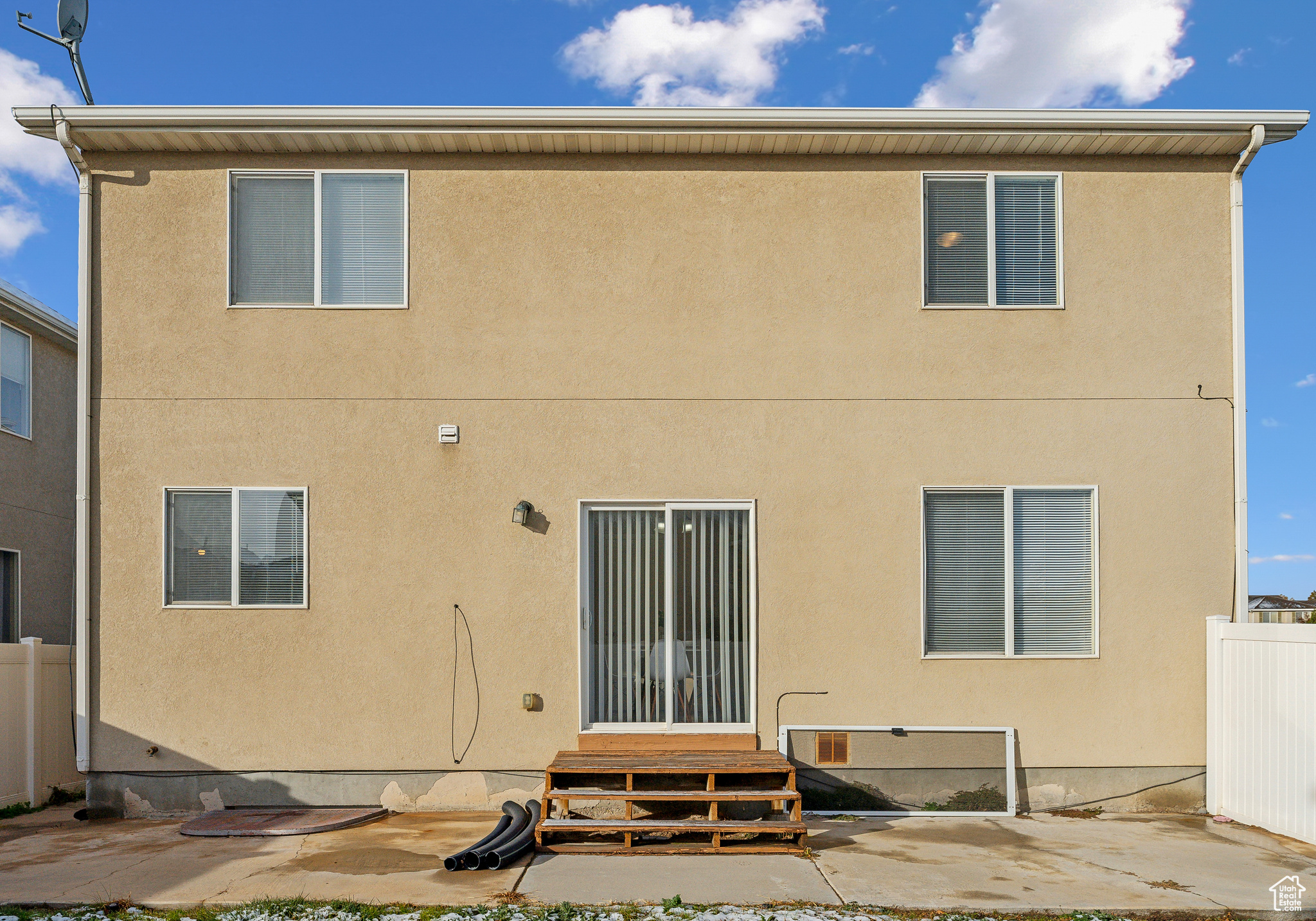 Rear view of house with a patio