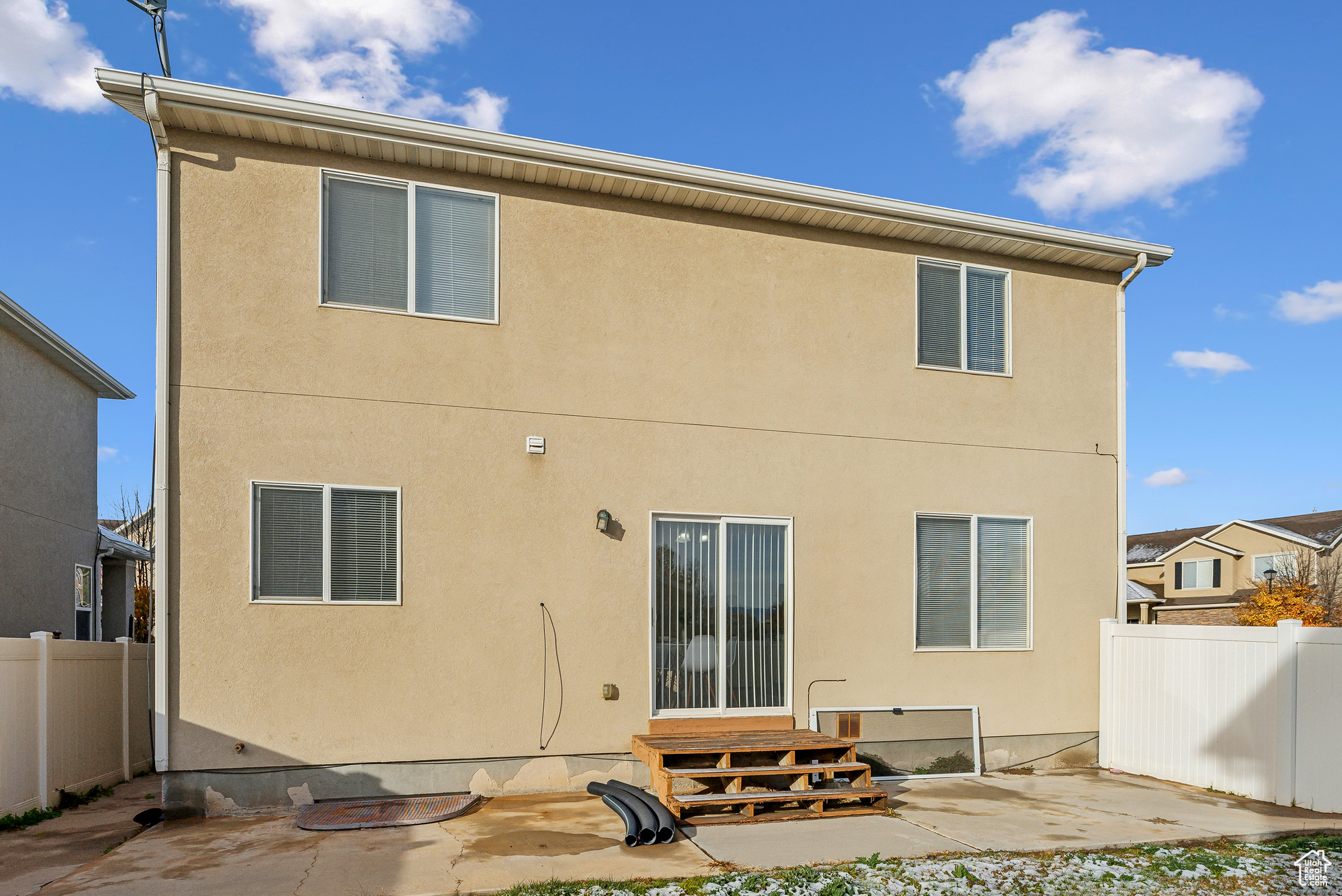 Back of property featuring a patio area