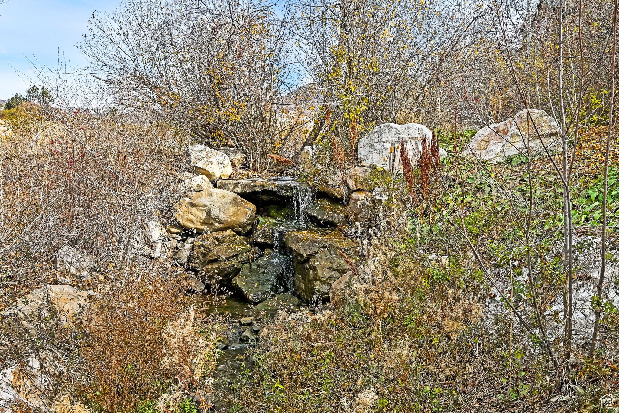 Year-round waterfall behind the building.