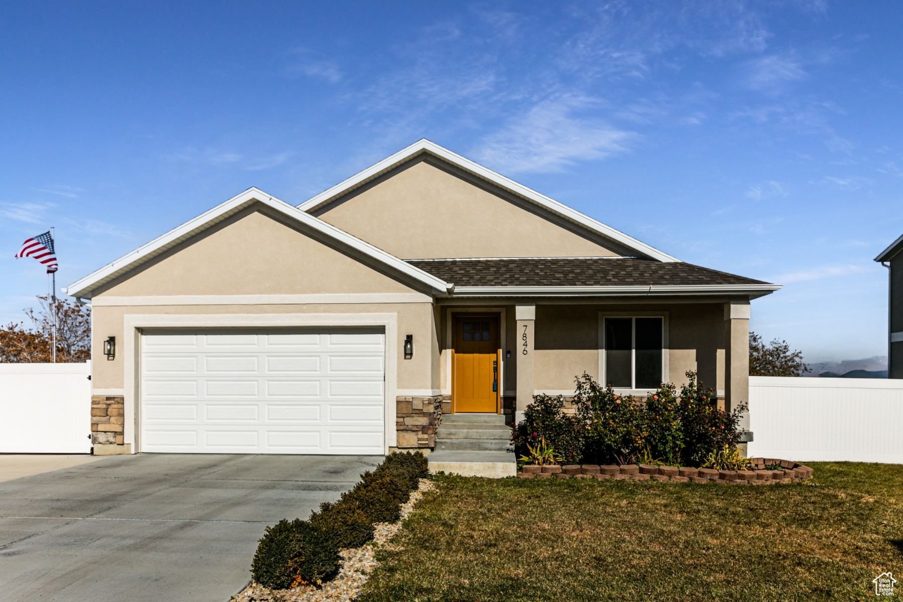 Ranch-style home with a front yard