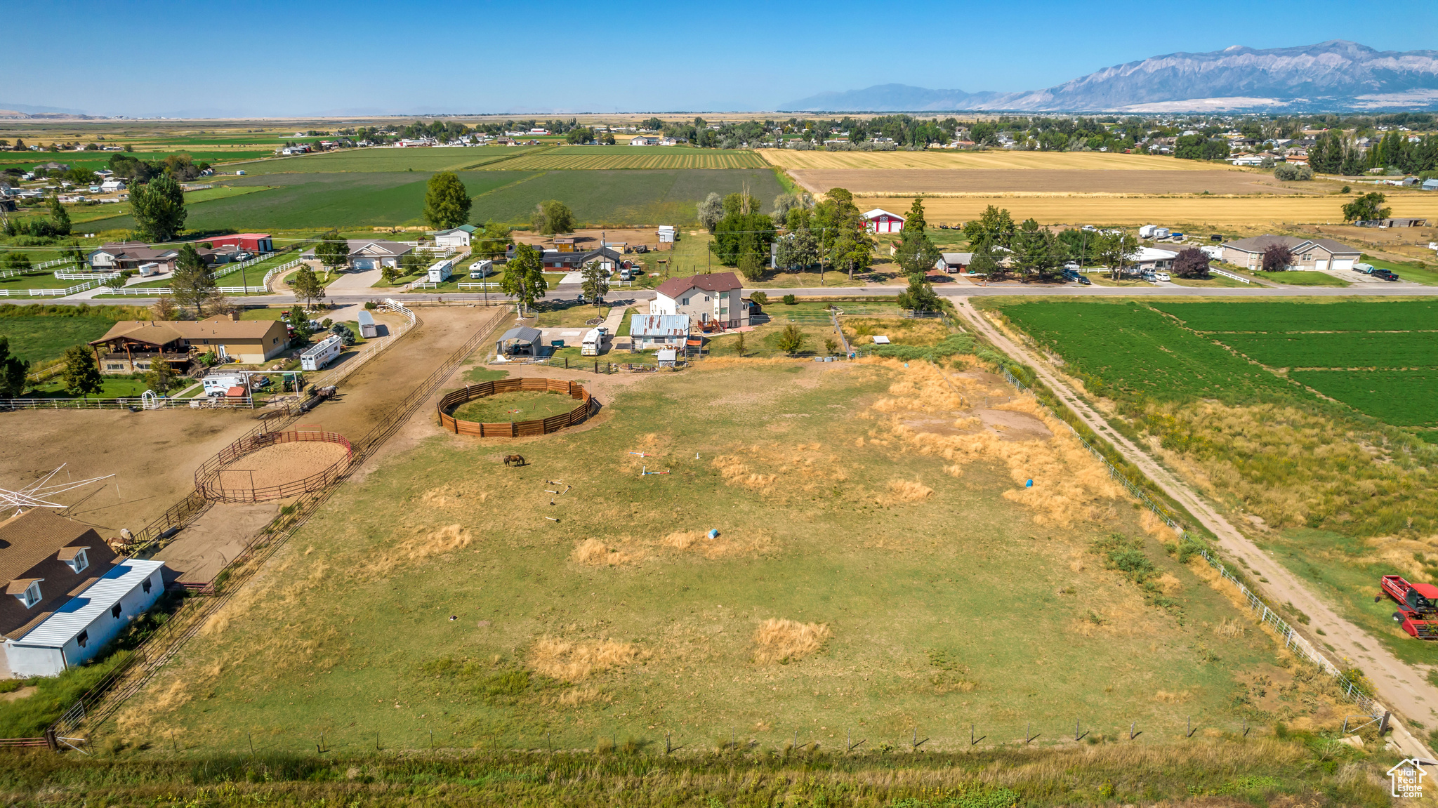 Birds eye view of property featuring a mountain view and a rural view