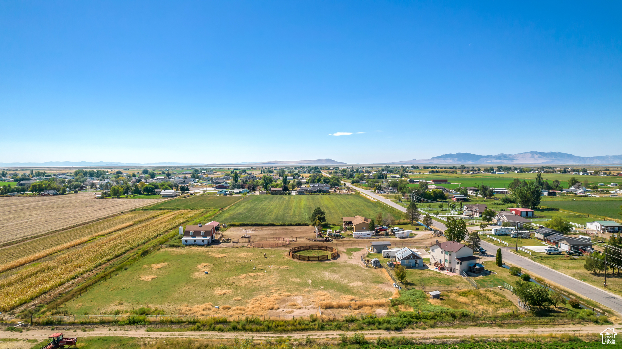 Birds eye view of property with a mountain view and a rural view