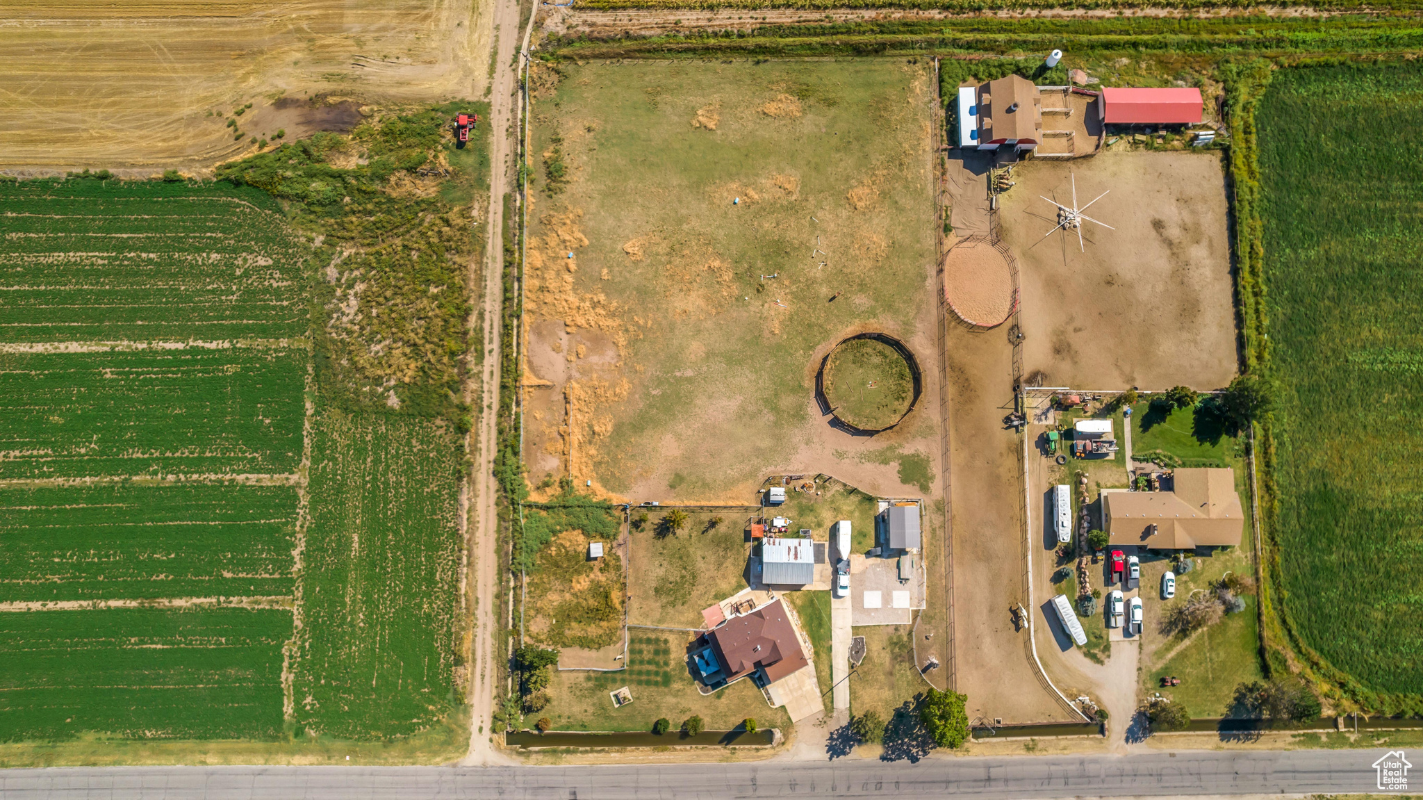 Birds eye view of property with a rural view