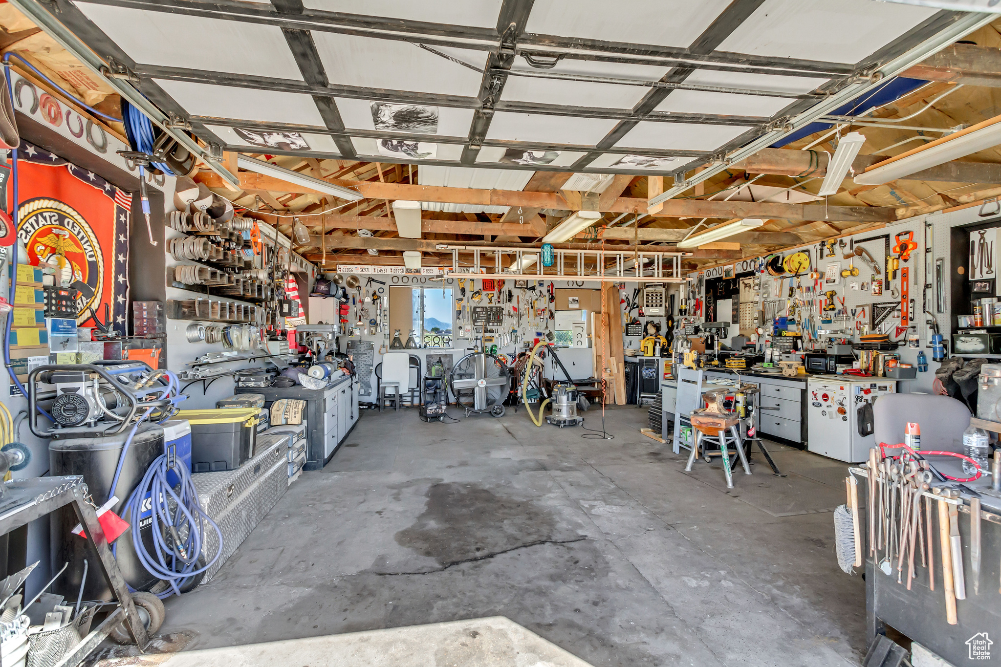 Garage featuring a workshop area