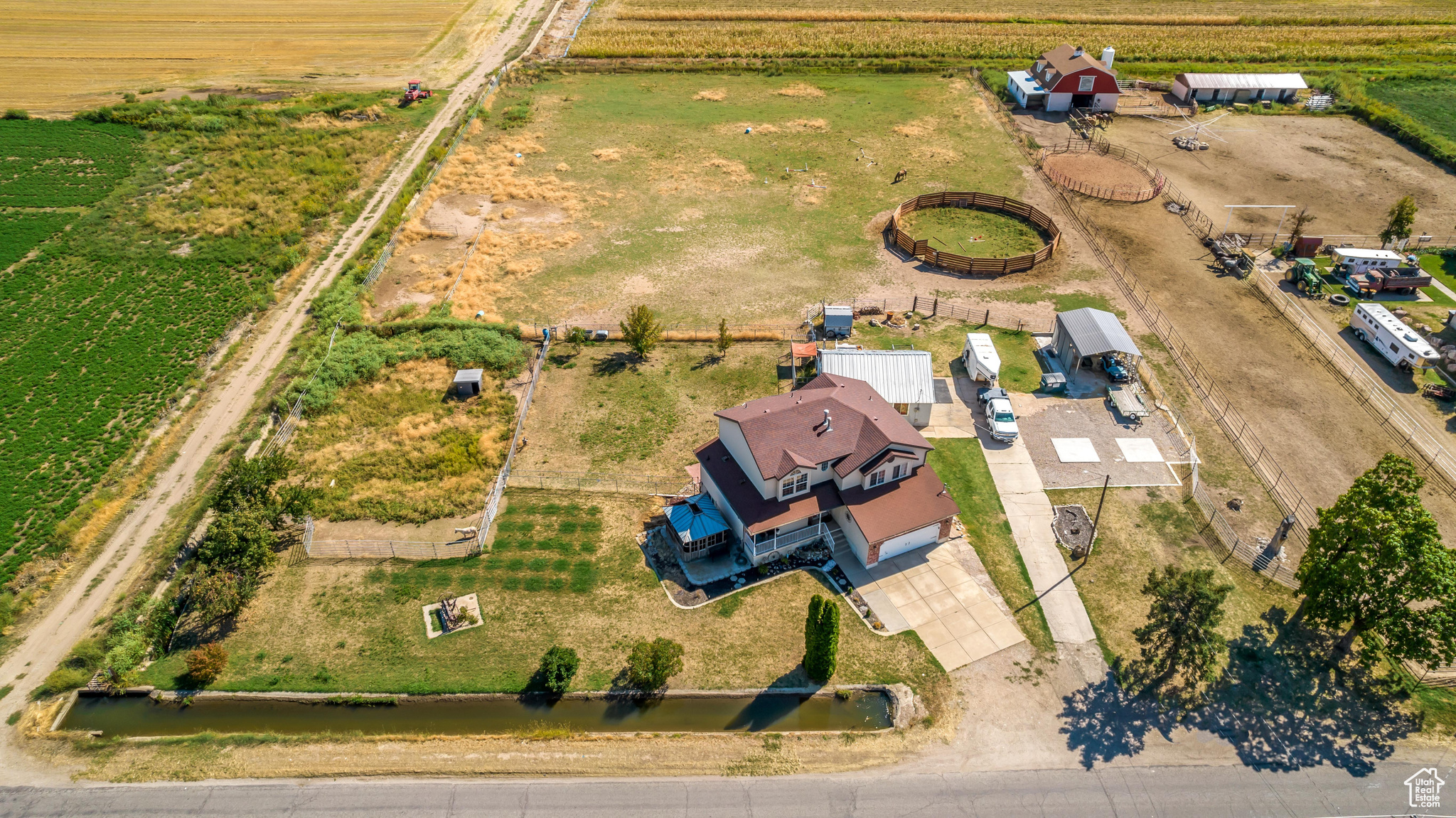 Birds eye view of property featuring a rural view