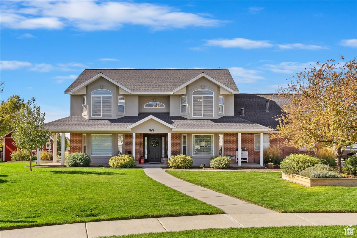 View of front of home with a front yard