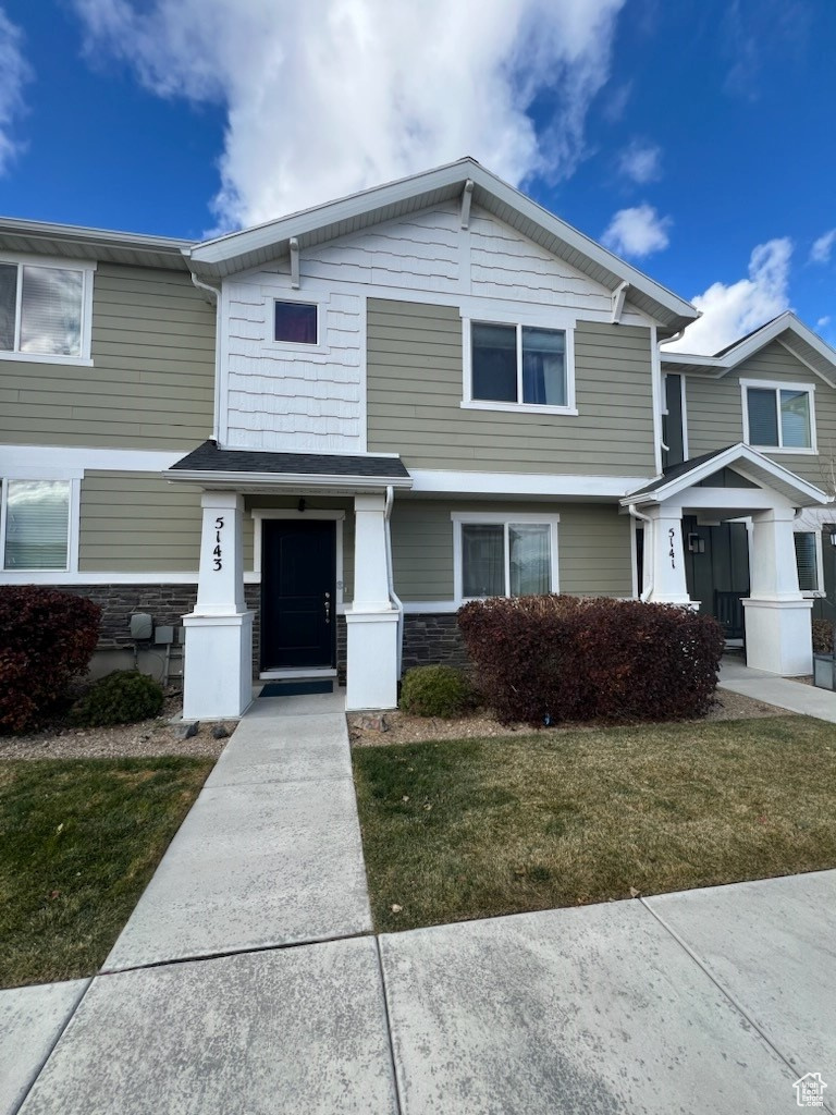 View of front of home with a front lawn