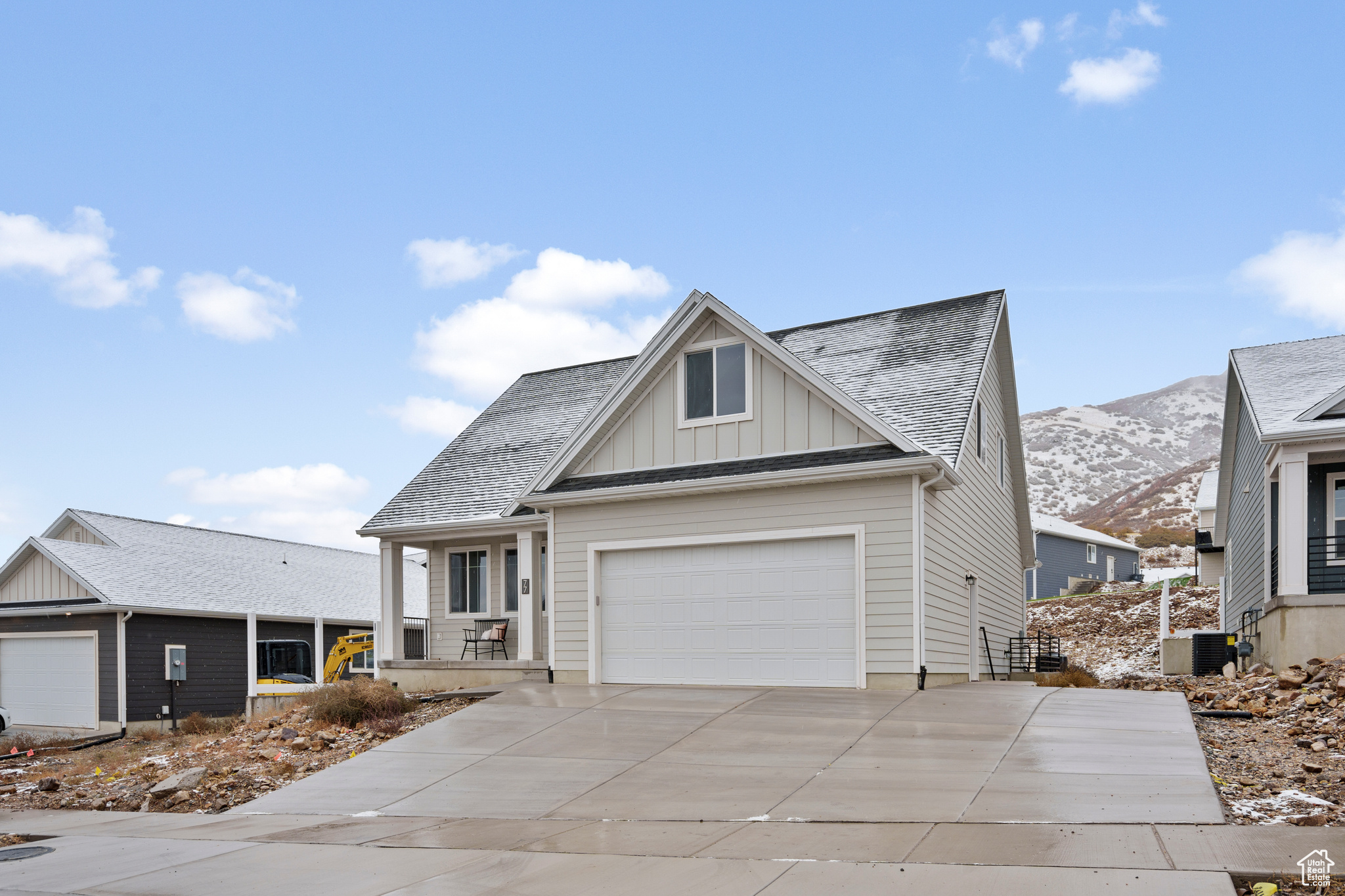 View of front of property with a mountain view