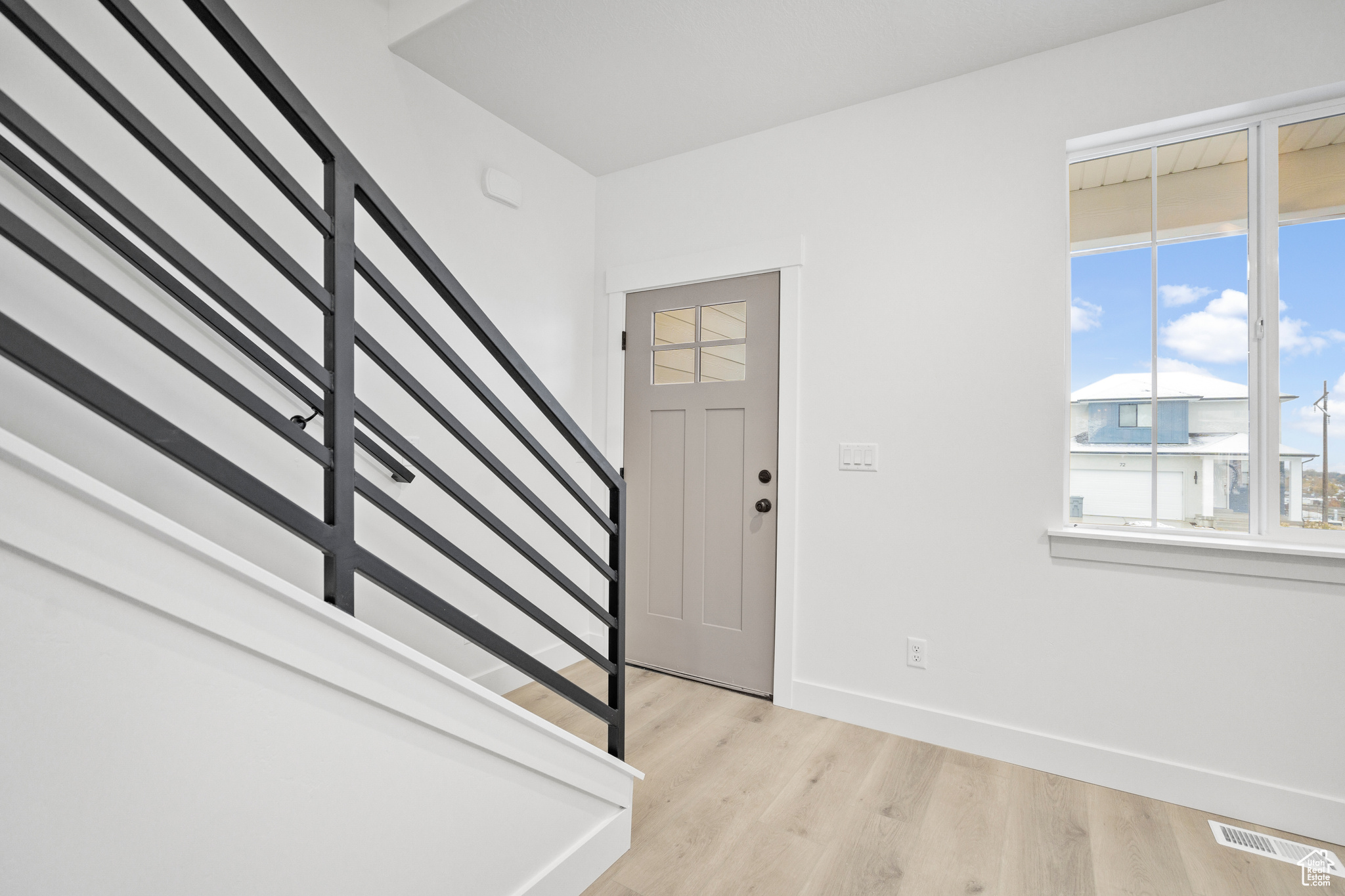 Foyer featuring light hardwood / wood-style floors