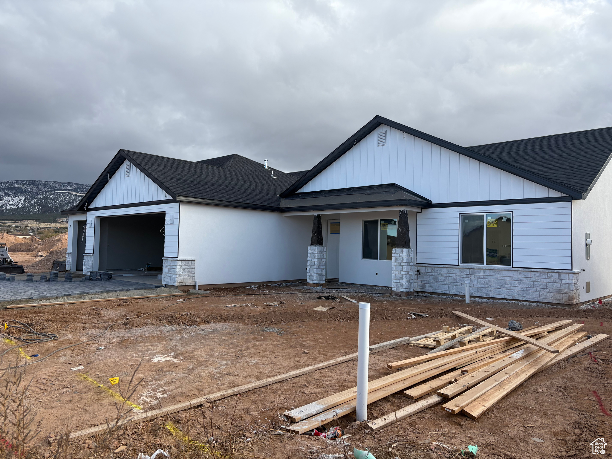 View of front of home featuring a garage