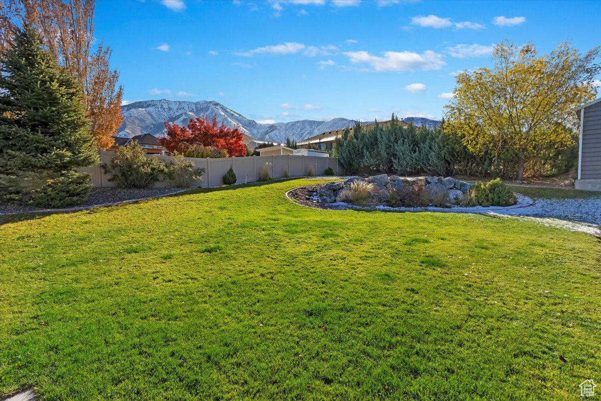 View of yard with a mountain view