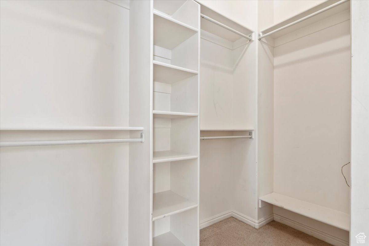 Walk in closet with LVP flooring