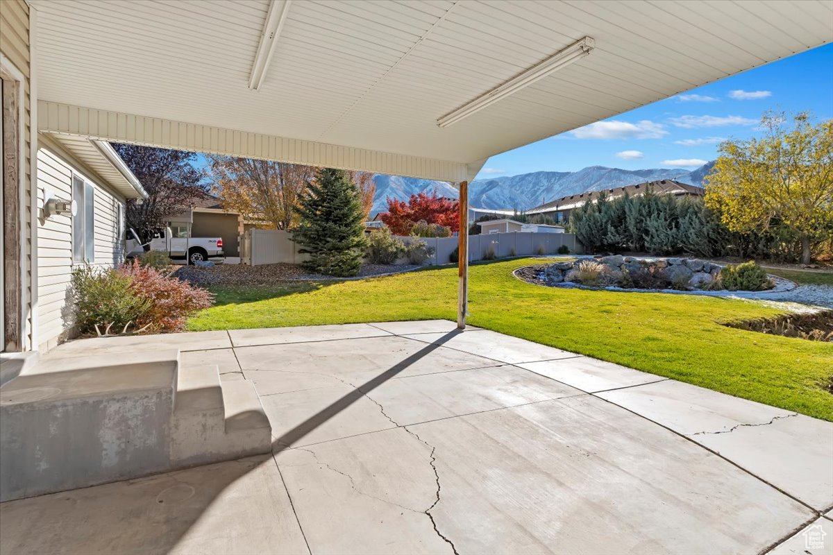 View of patio with a mountain view