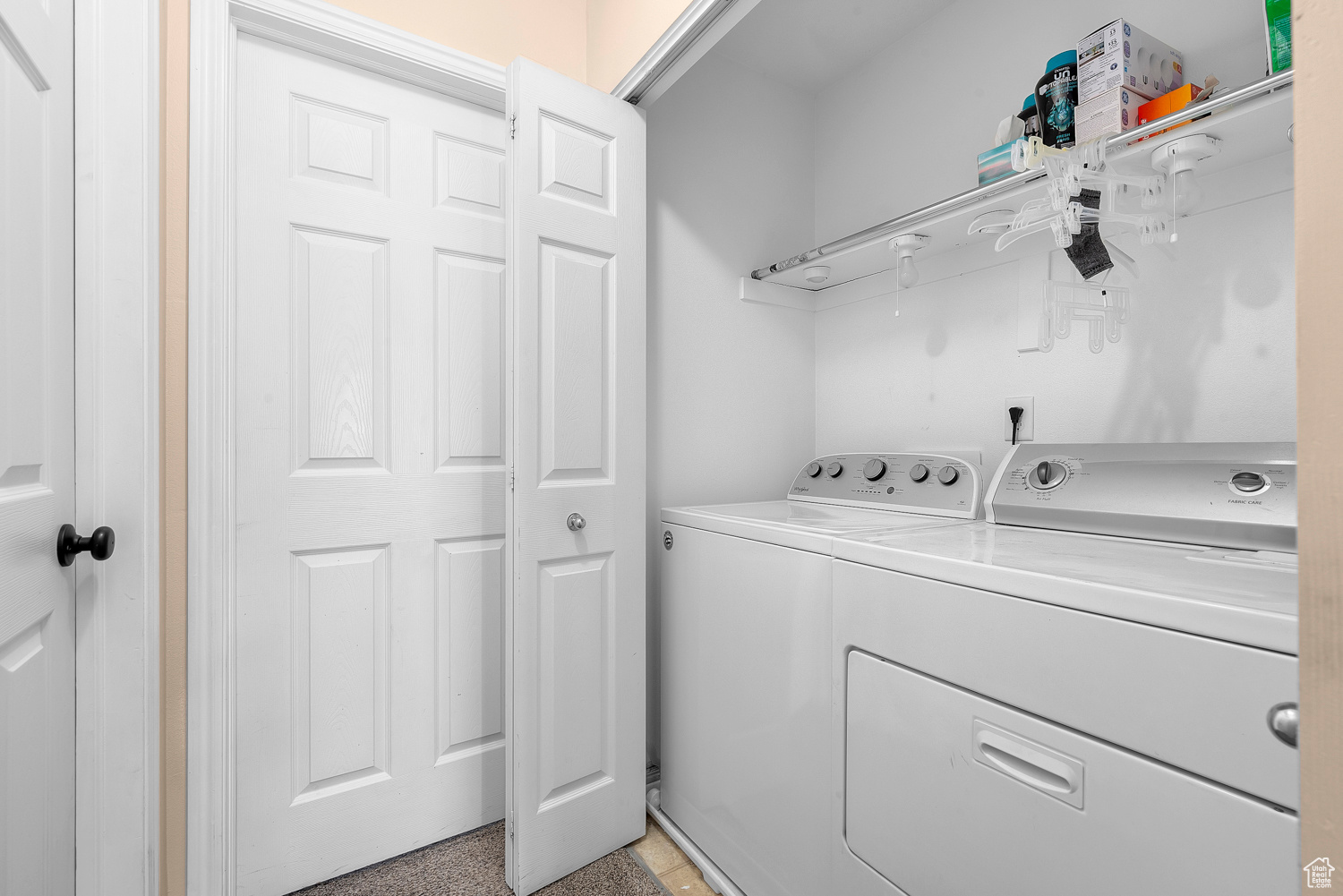 Washroom featuring separate washer and dryer