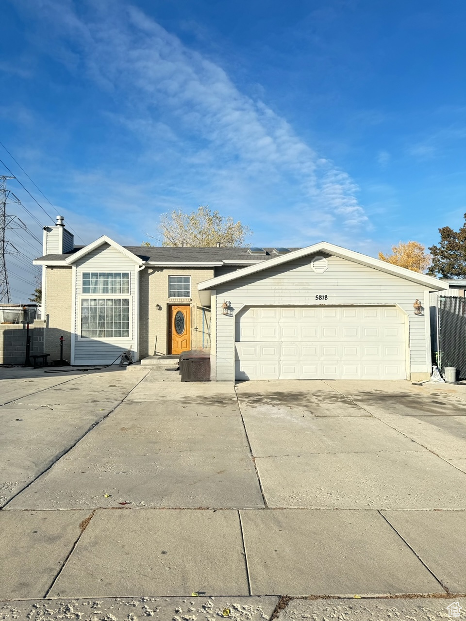 Ranch-style home with a garage