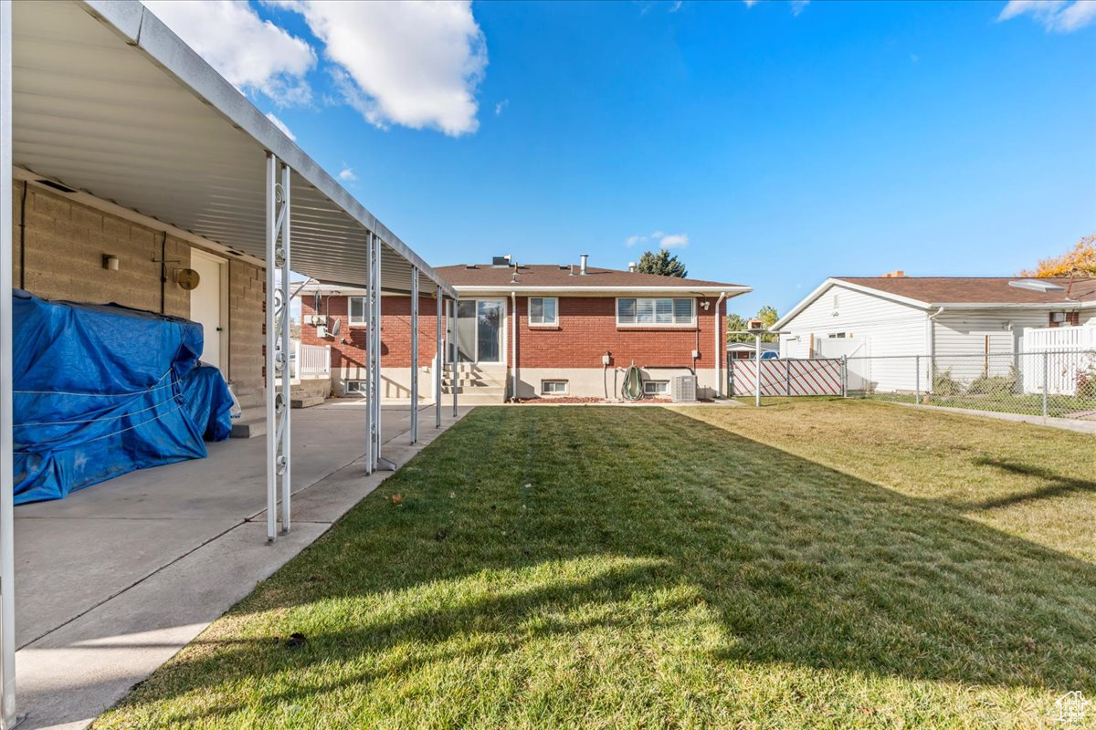 View of yard with a patio area