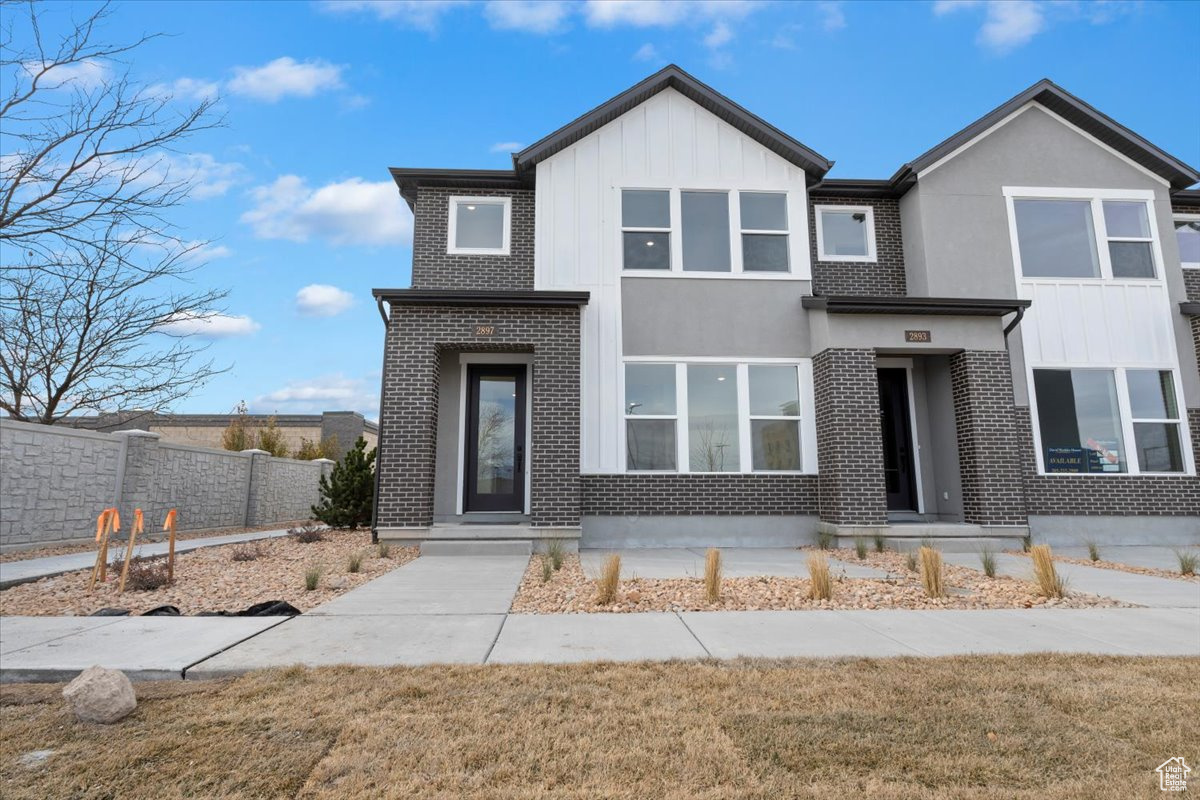 View of front of house with a front lawn