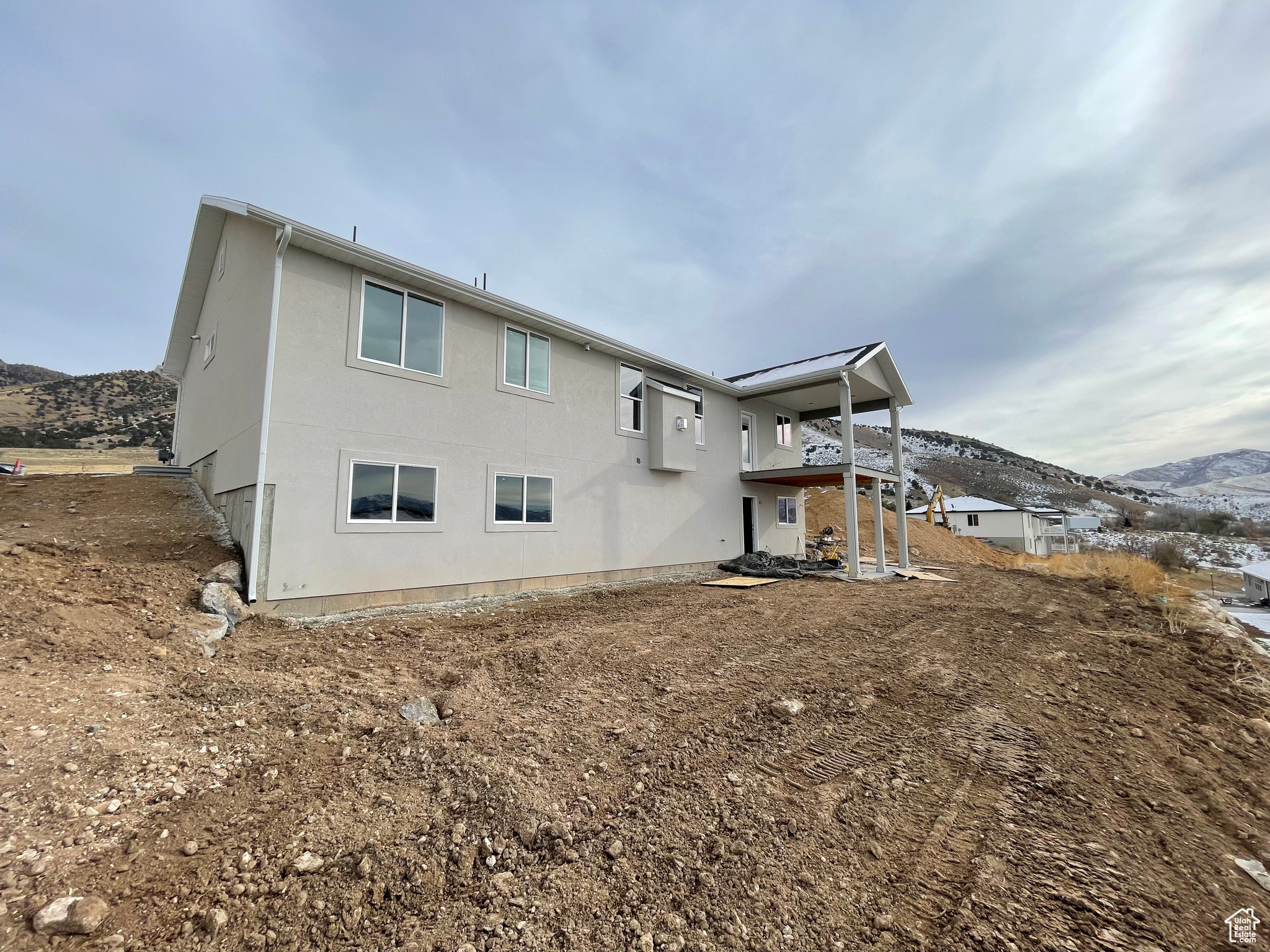 Rear view of house with a mountain view