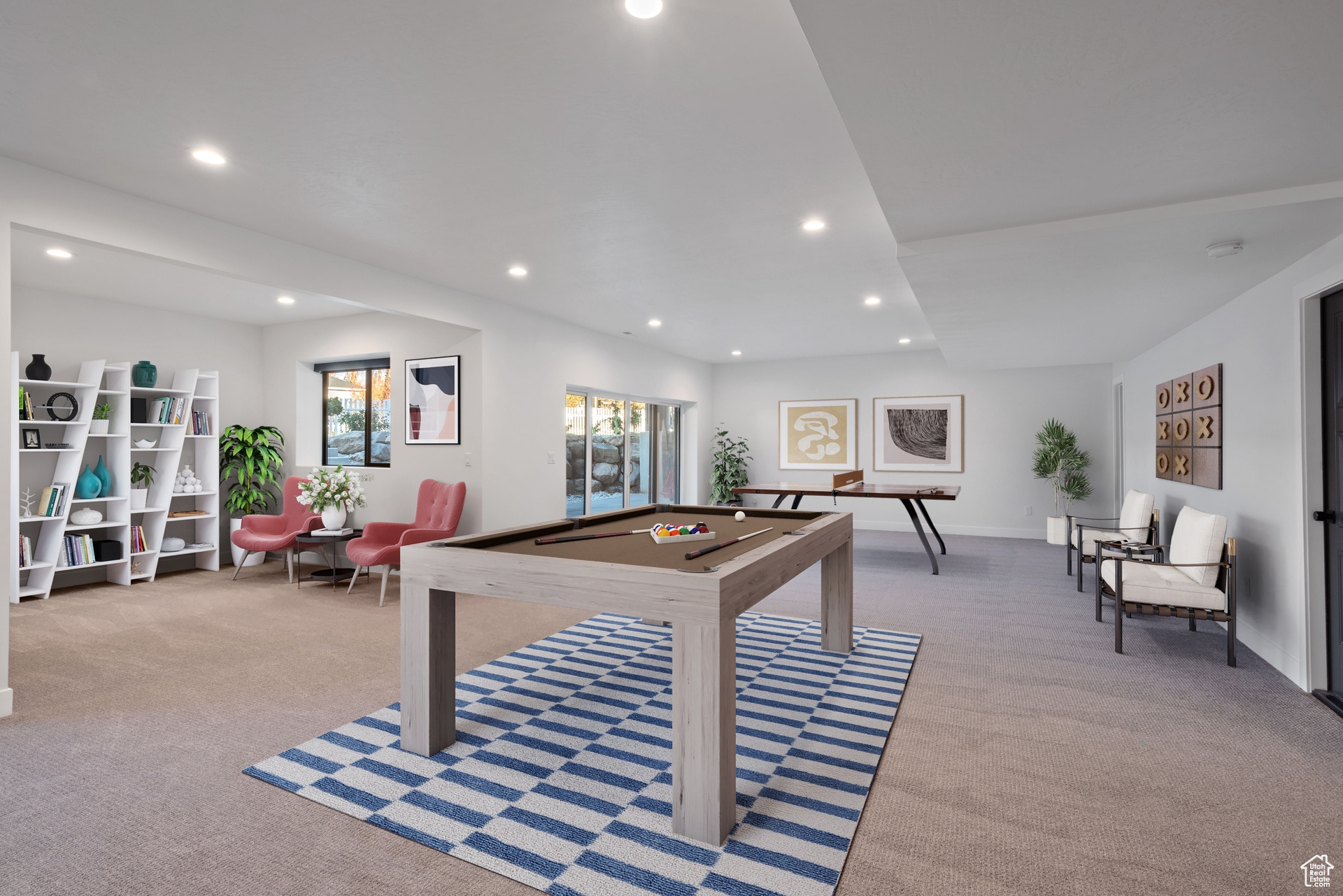 Recreation room with carpet flooring and billiards