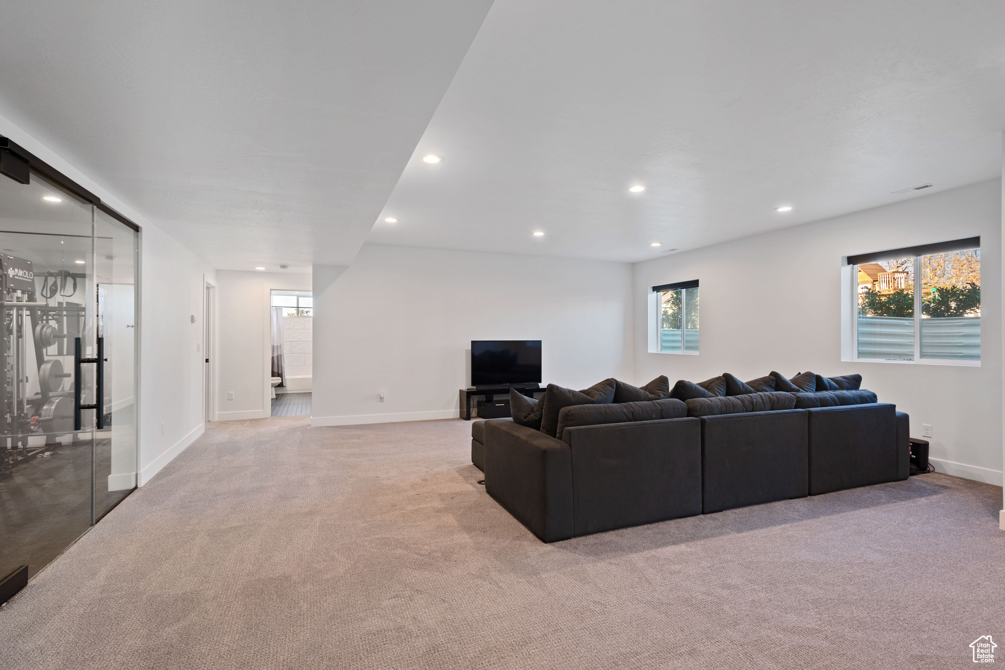 Living room with light carpet