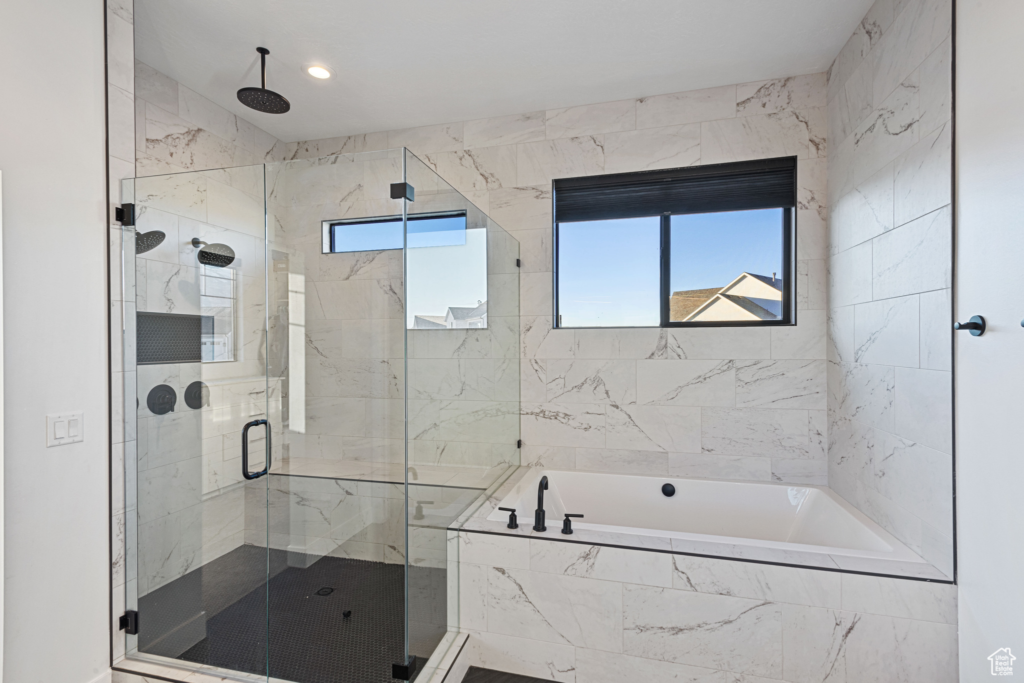 Bathroom with shower with separate bathtub