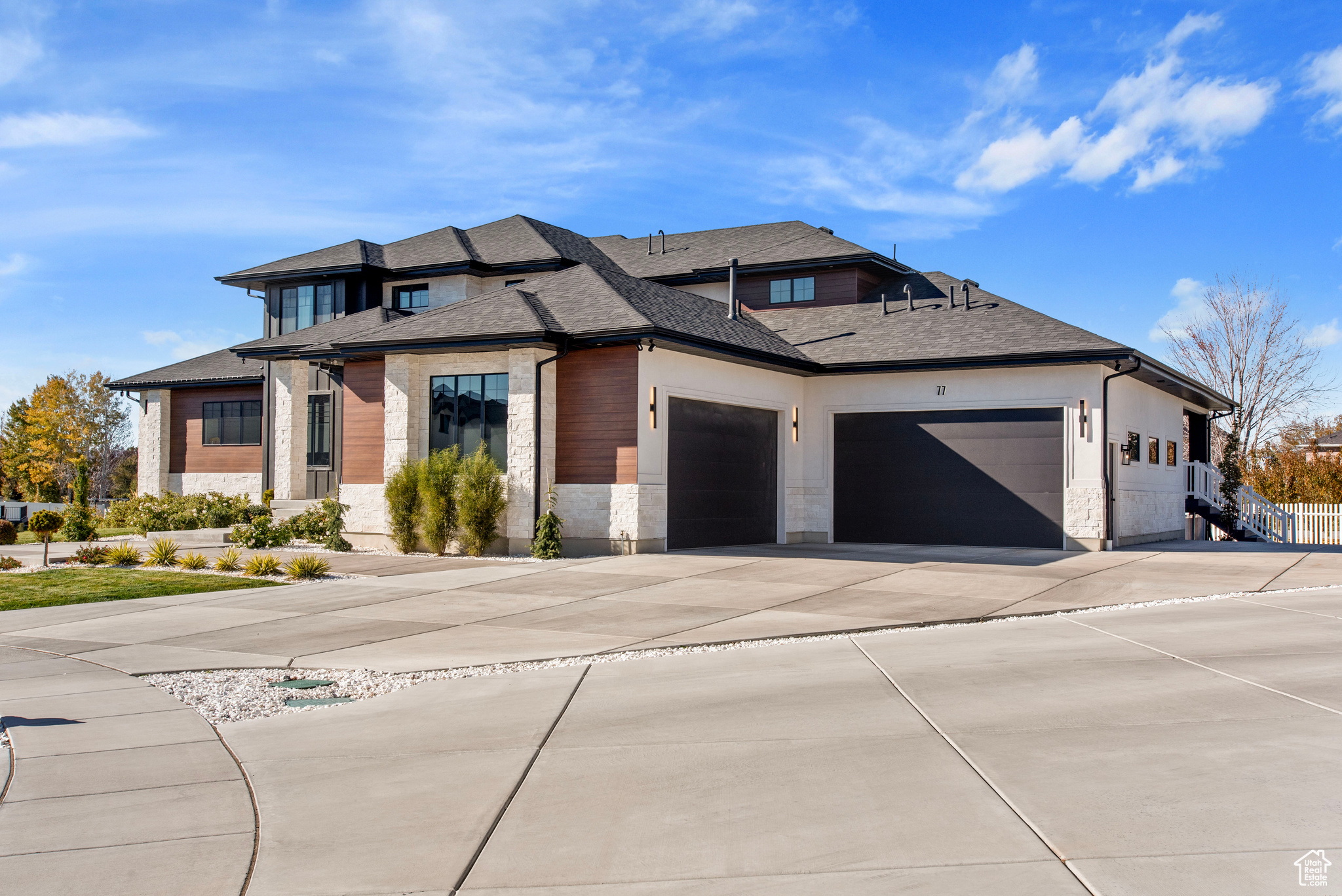 Prairie-style house featuring a garage