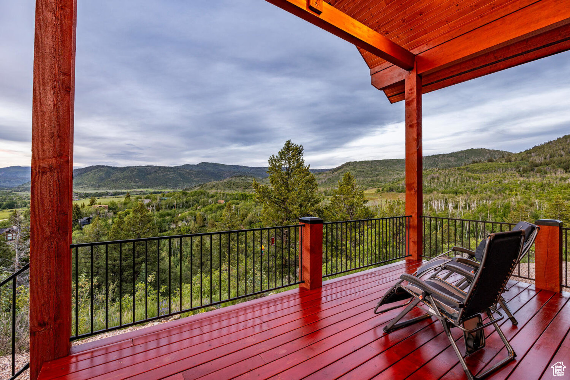 Wooden deck featuring a mountain view