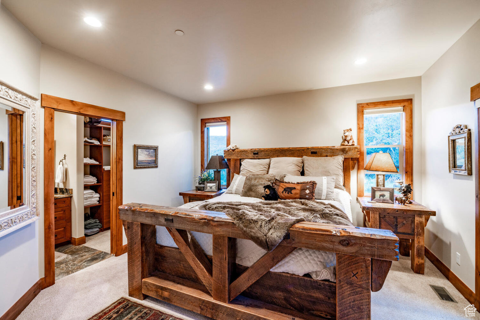 Bedroom with light colored carpet