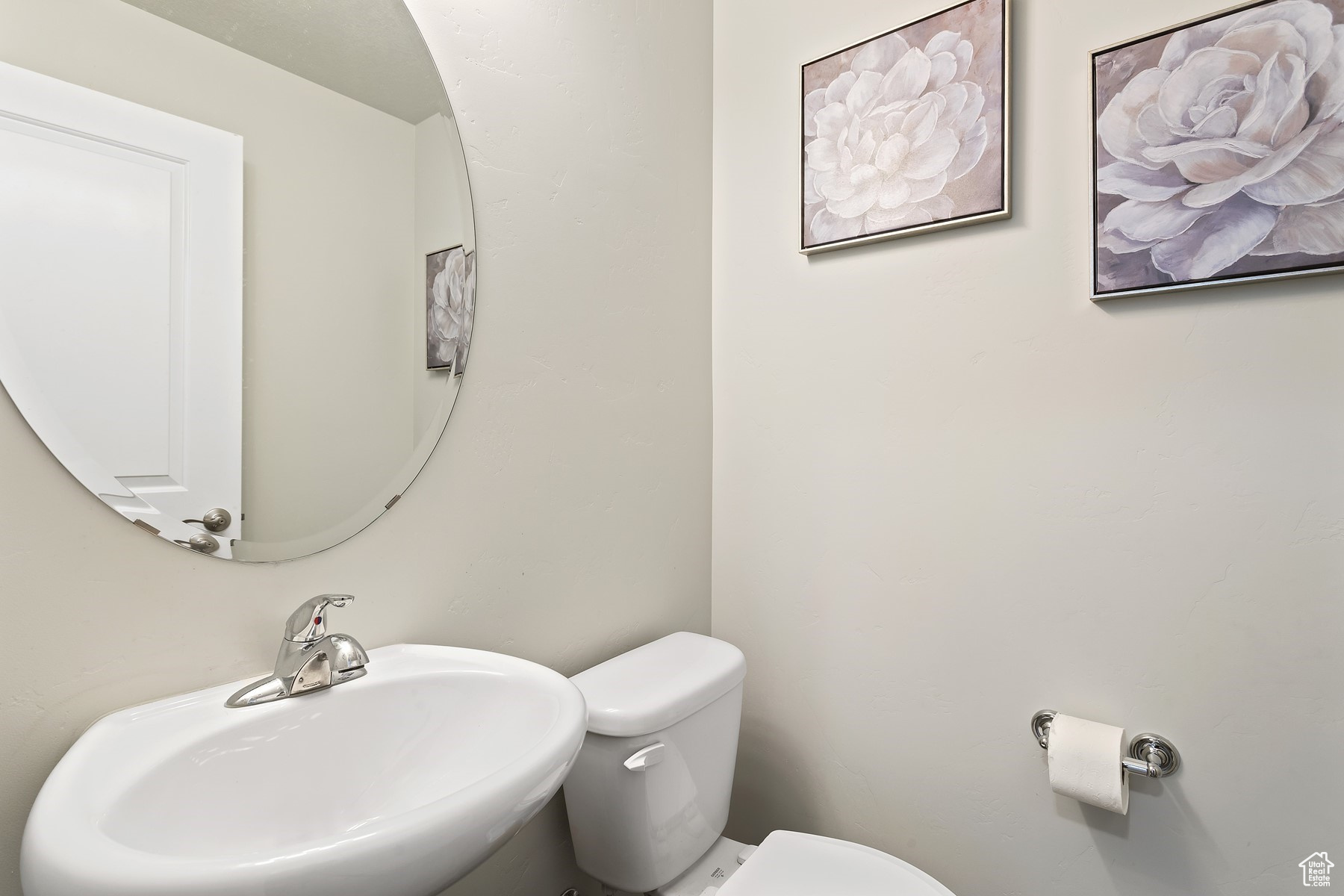 Bathroom with sink and toilet