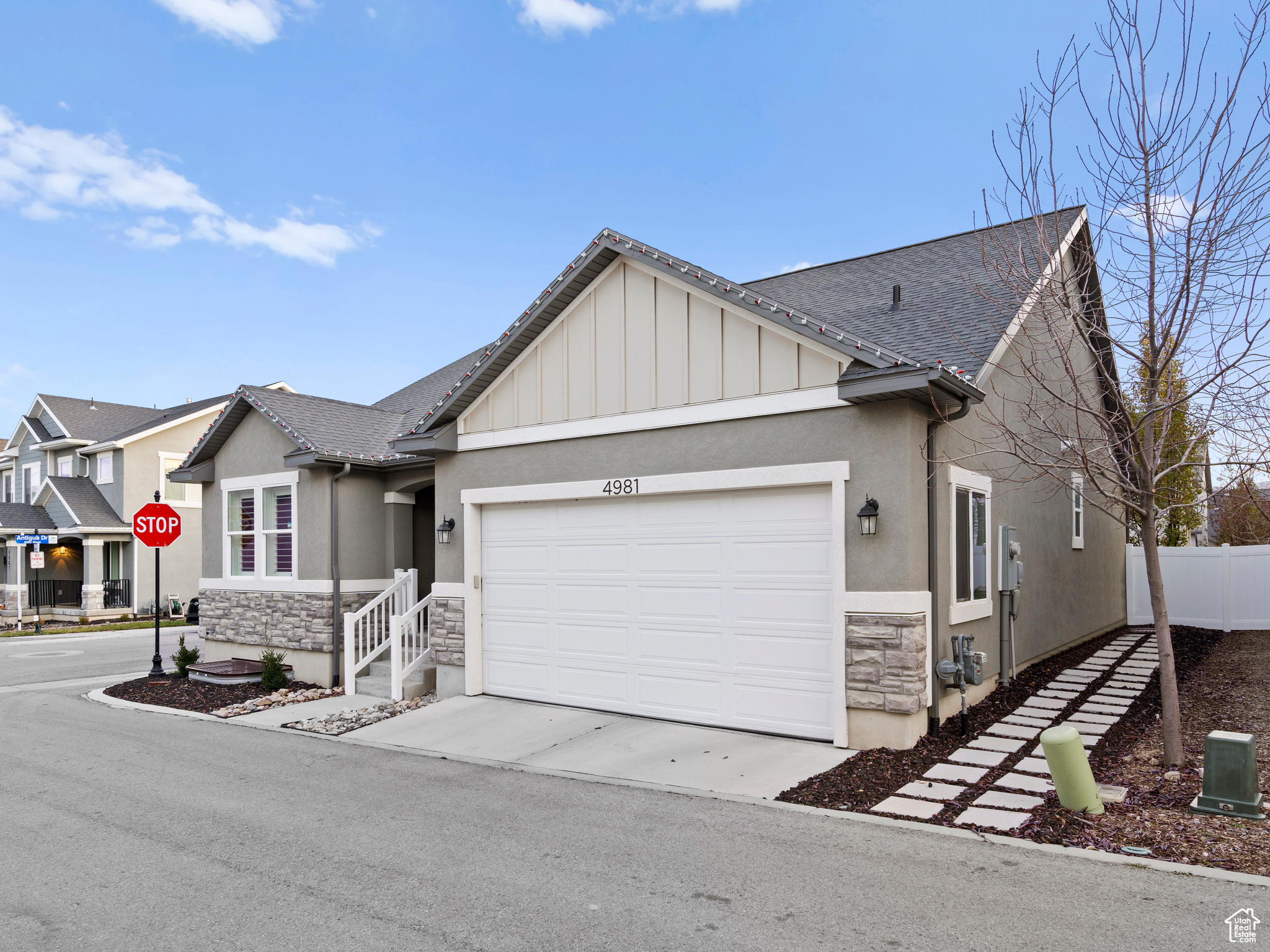 View of front of property with a garage