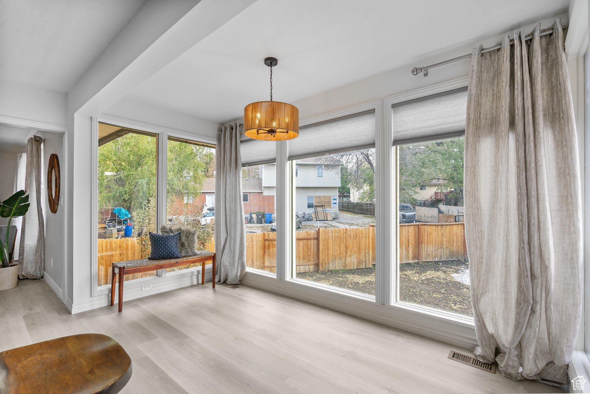 Interior space featuring wood-type flooring and a wealth of natural light