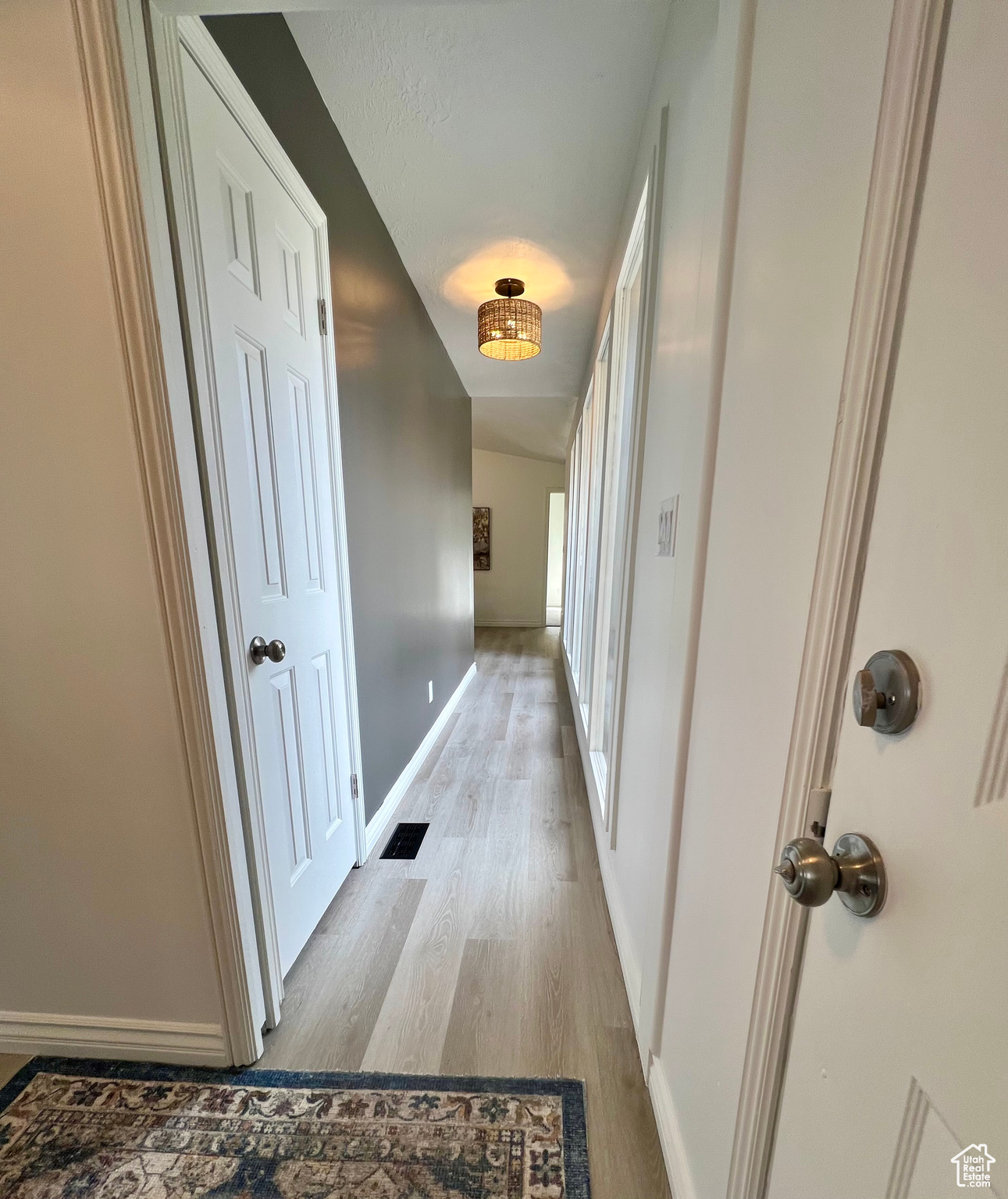 Hall with light wood-type flooring