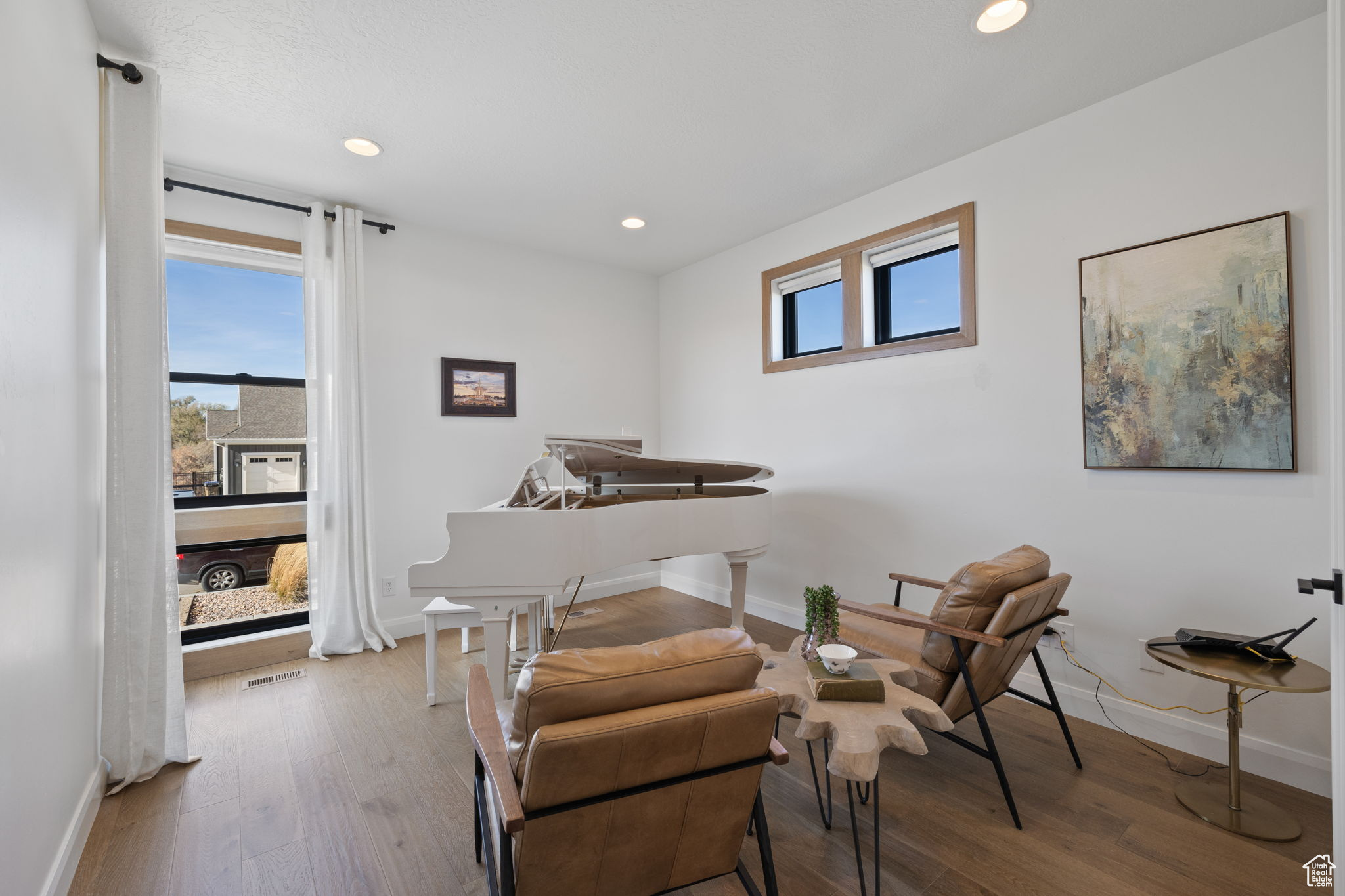 Living area featuring hardwood / wood-style flooring