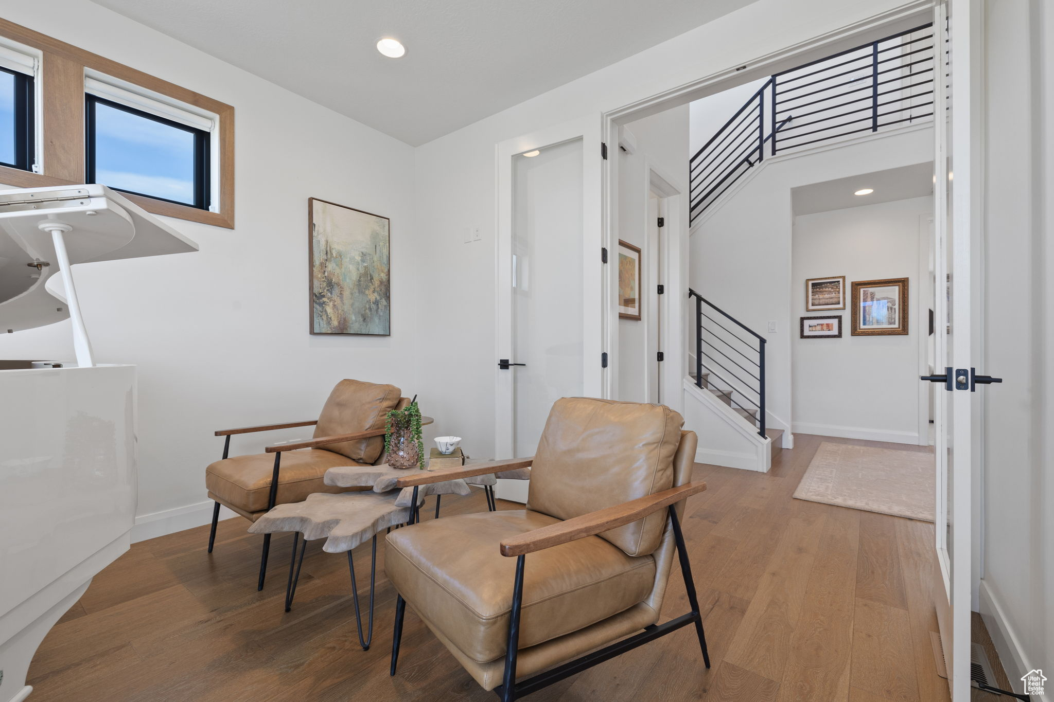 Sitting room featuring light hardwood / wood-style flooring