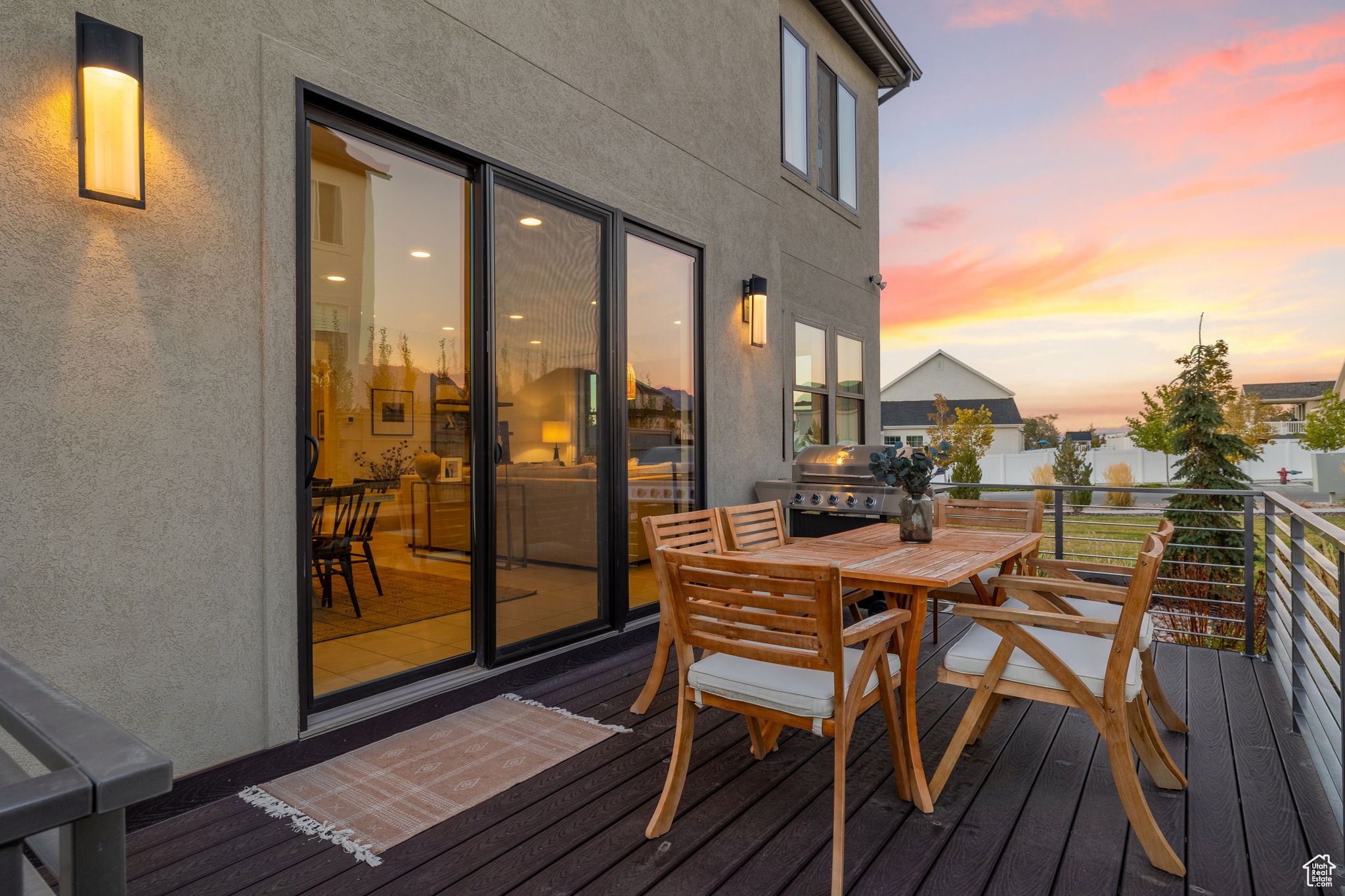 Deck at dusk with a grill