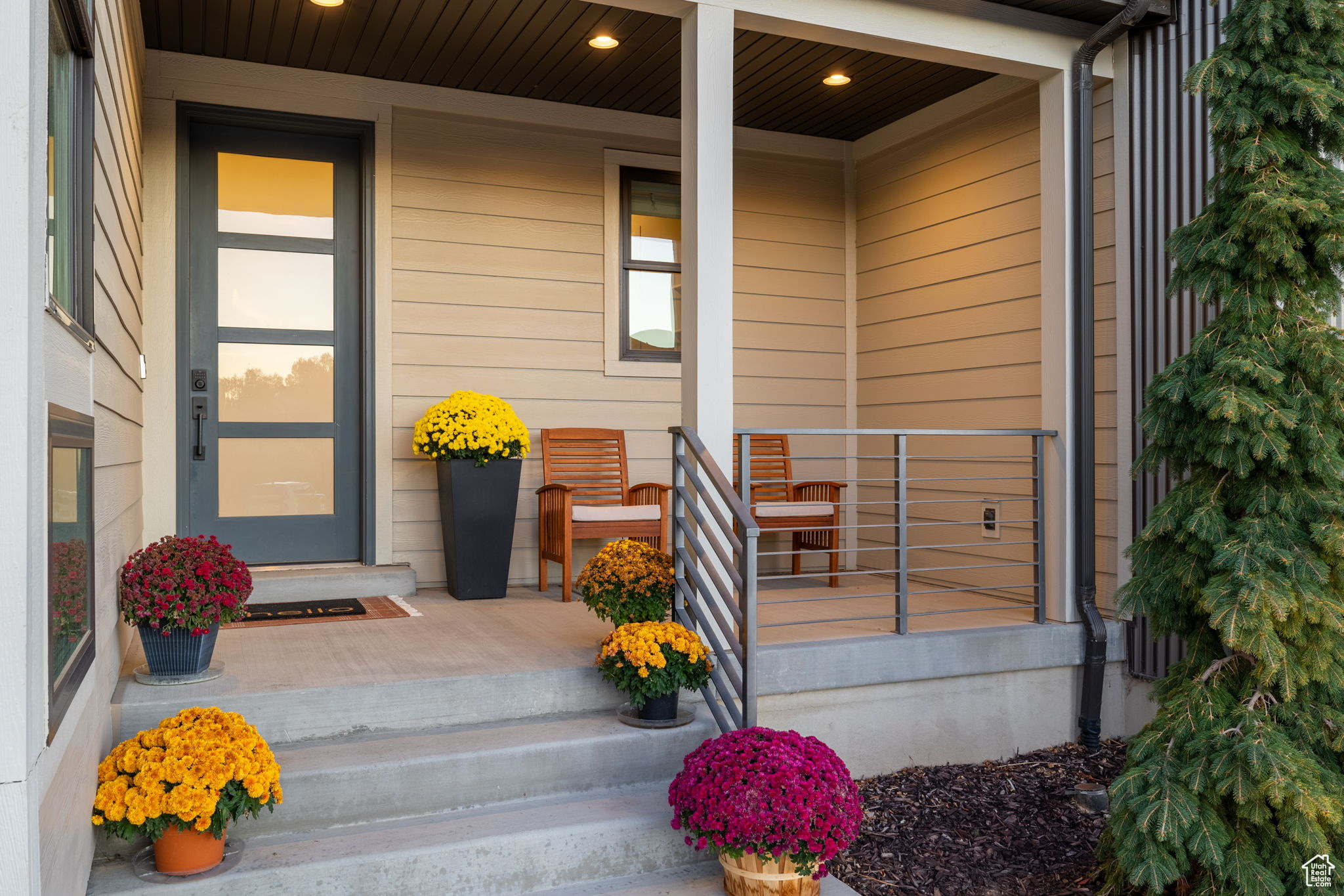 Doorway to property featuring a porch